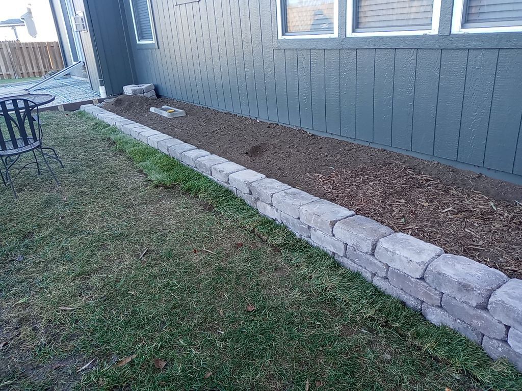 Back Yard Stamped Patio and Pergola by LAND ESCAPES LLC