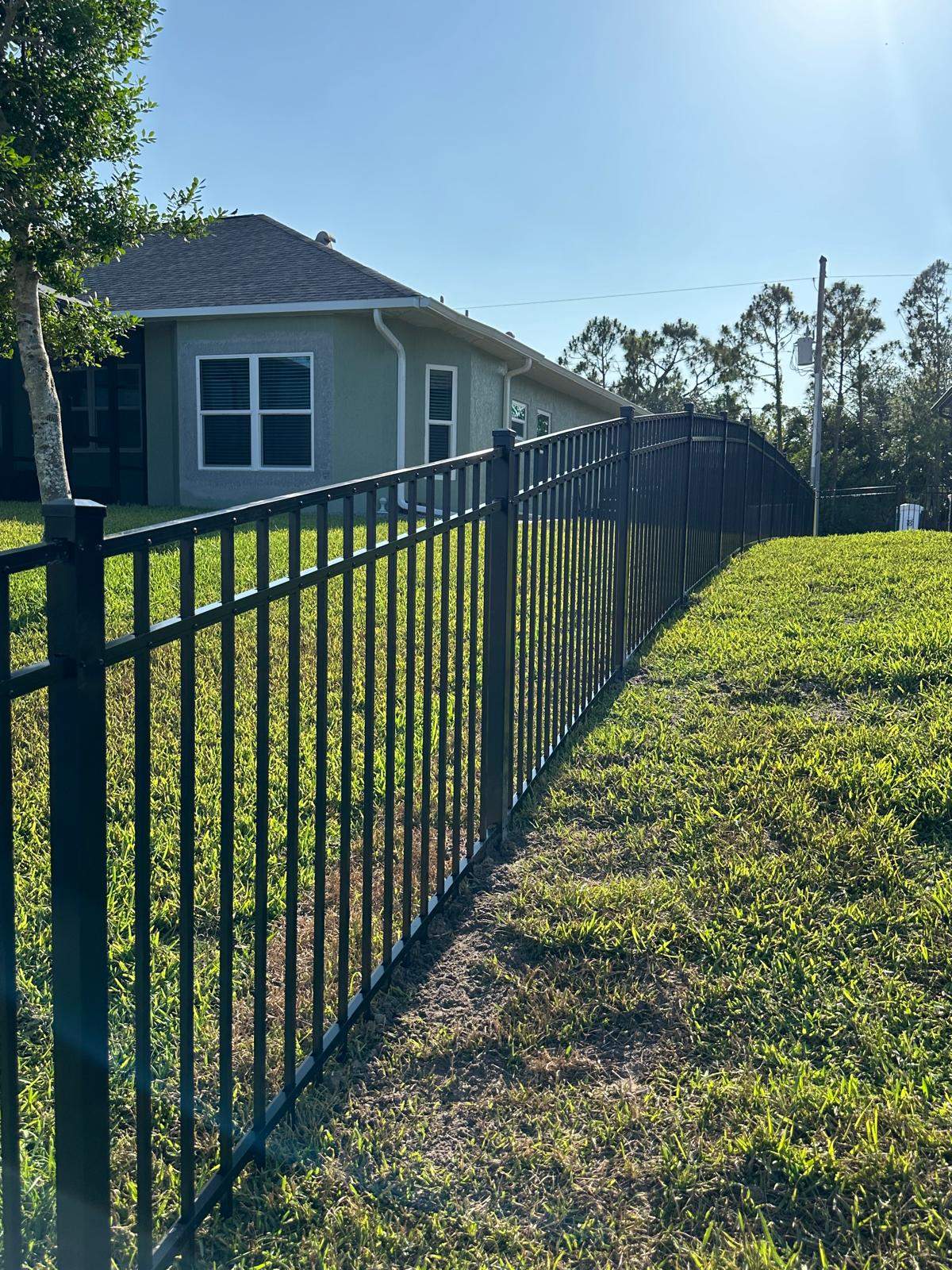 Waterfront Black Aluminum Fence Installation in Port Charlotte by True Fence LLC