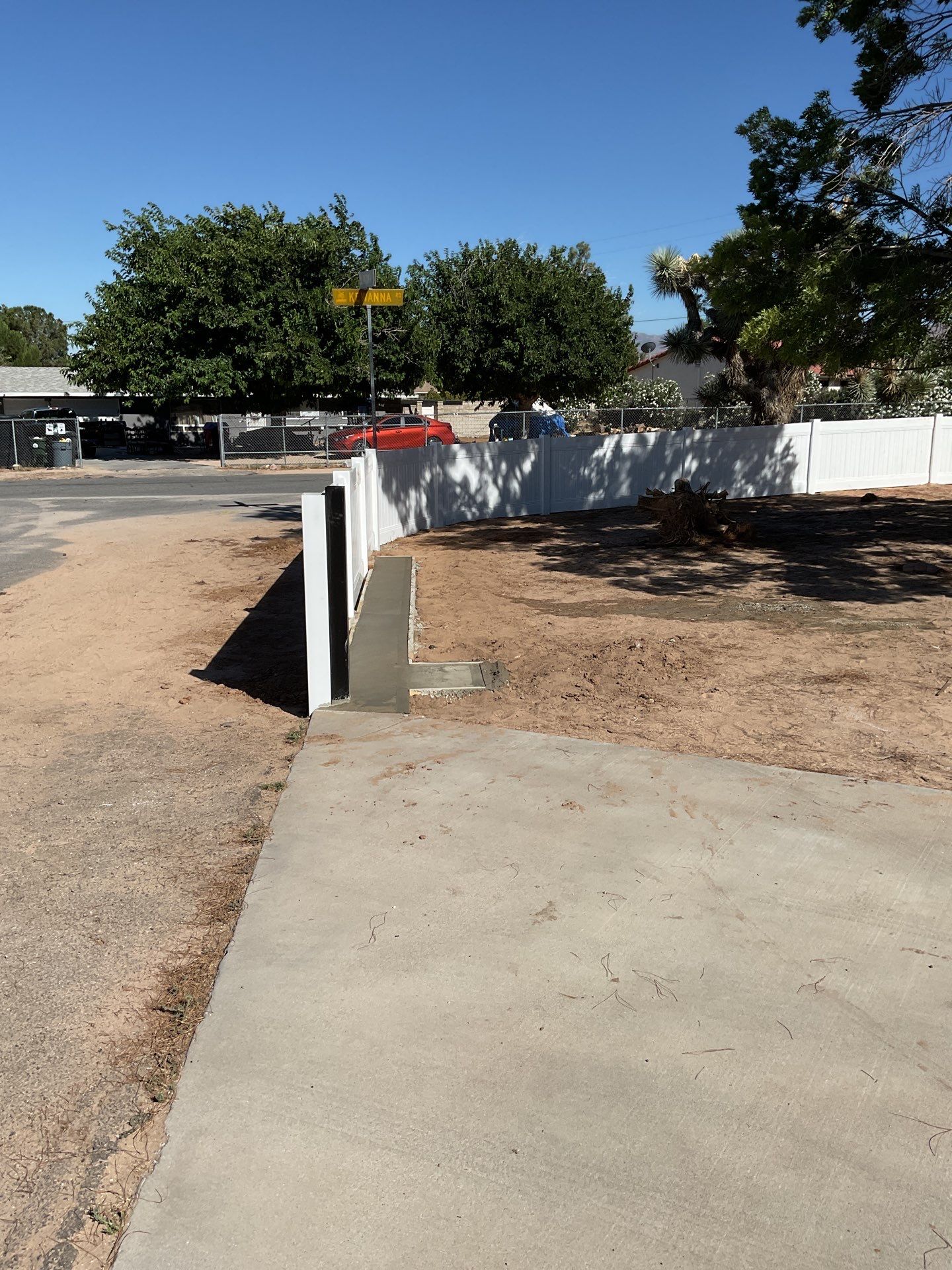 4ft White Vinyl Fence with Solar Power Motorized Gate by Fence Guys Inc.