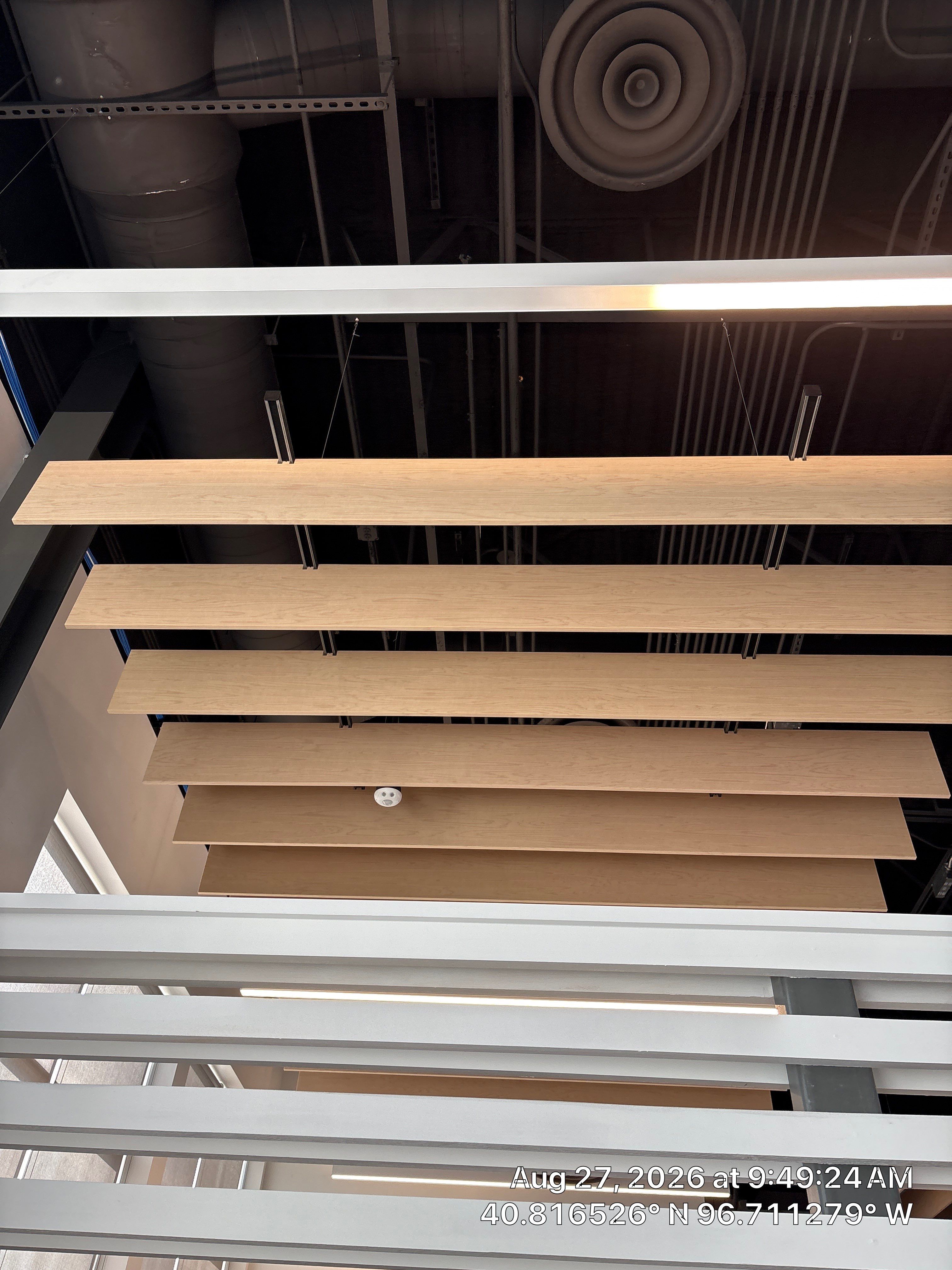 Modern Office Interior Renovation with Acoustic Wood Baffles in Lincoln by CompanyCam Sales Demo