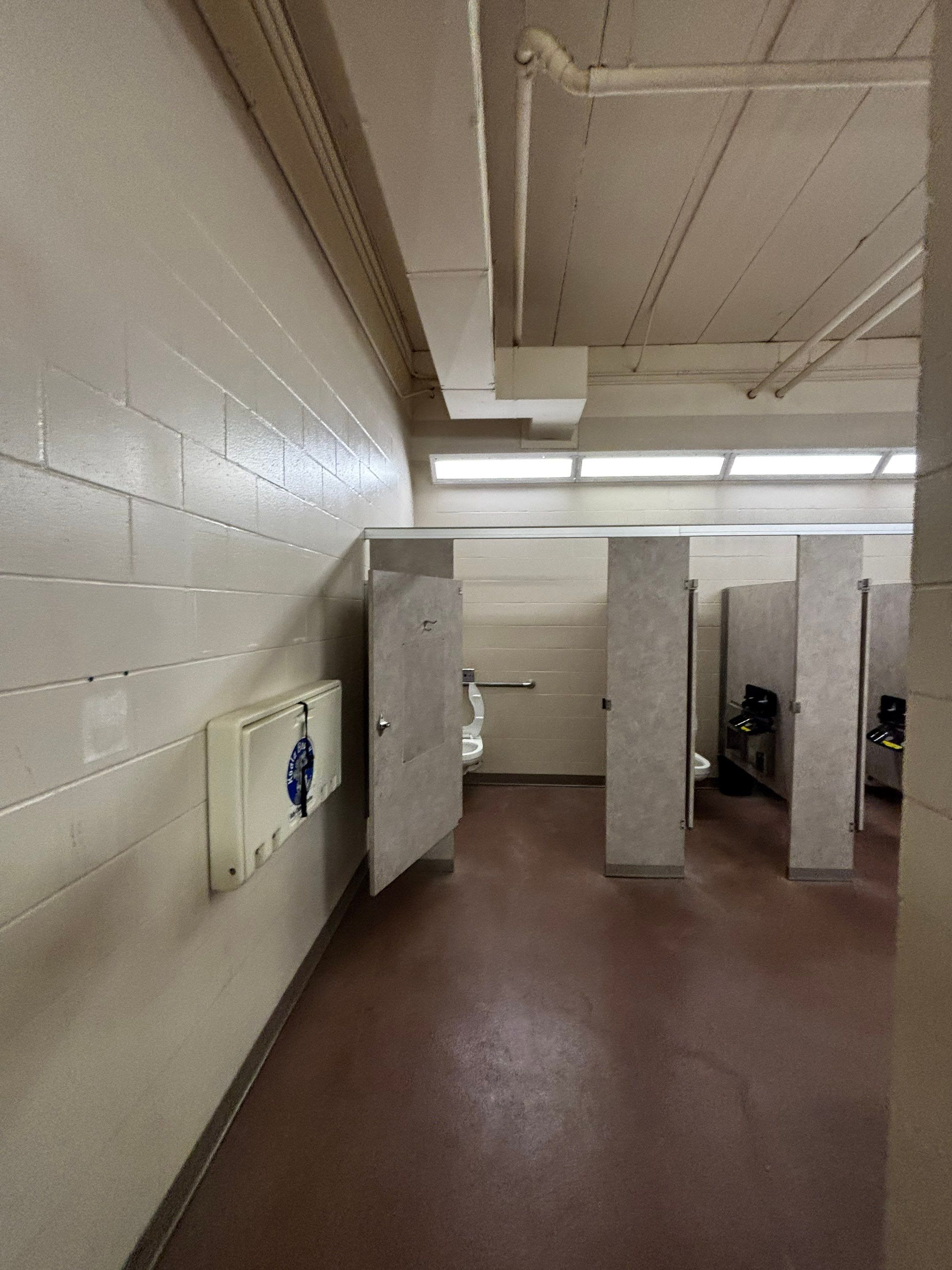 Commercial Restroom Interior Painting and Facility Updates in Sioux Falls by Select Painting, Coatings & Garage Cabinets