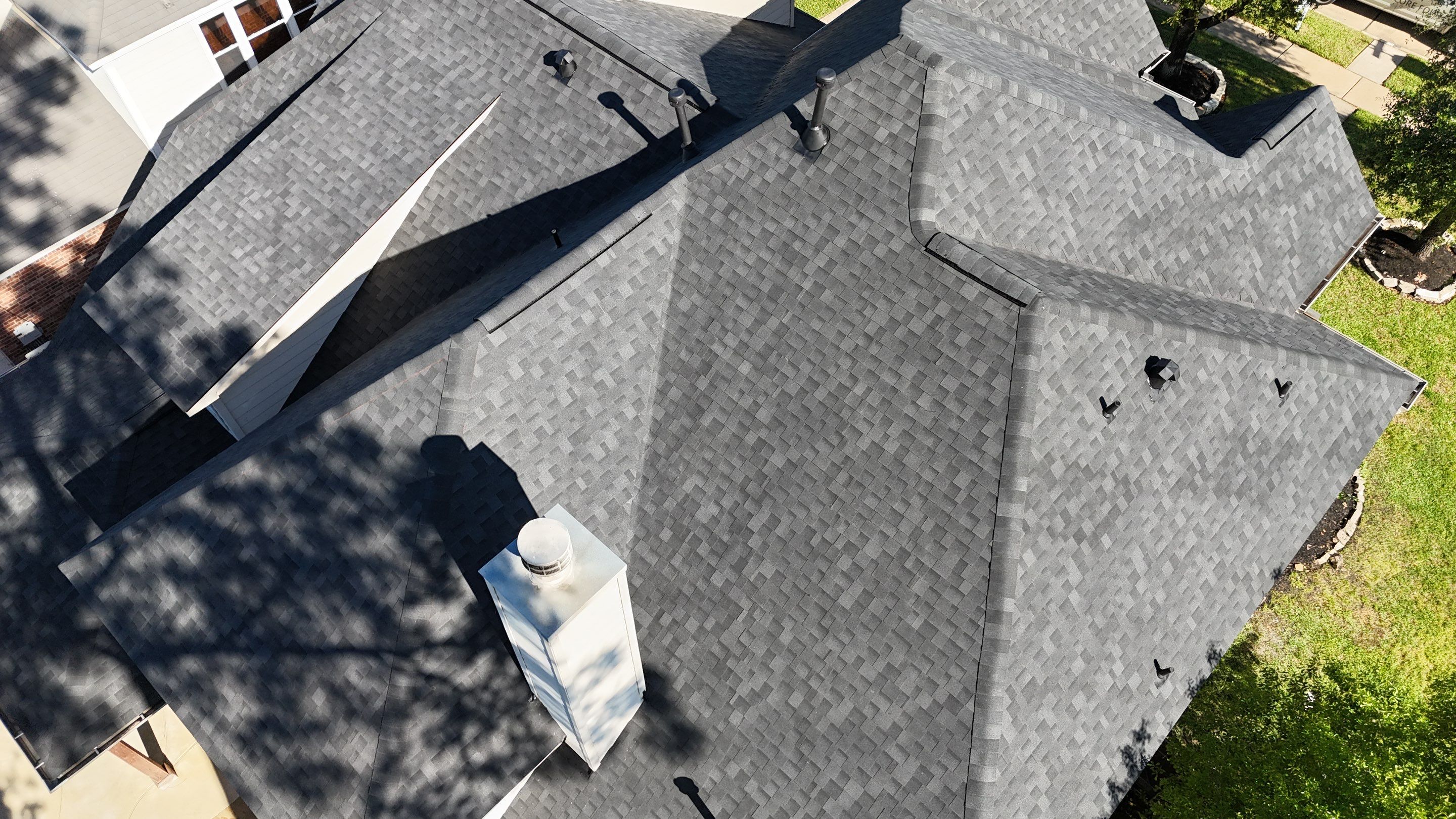 Residential Roofing Installation using Architectural Shingles by Core Four Roofing