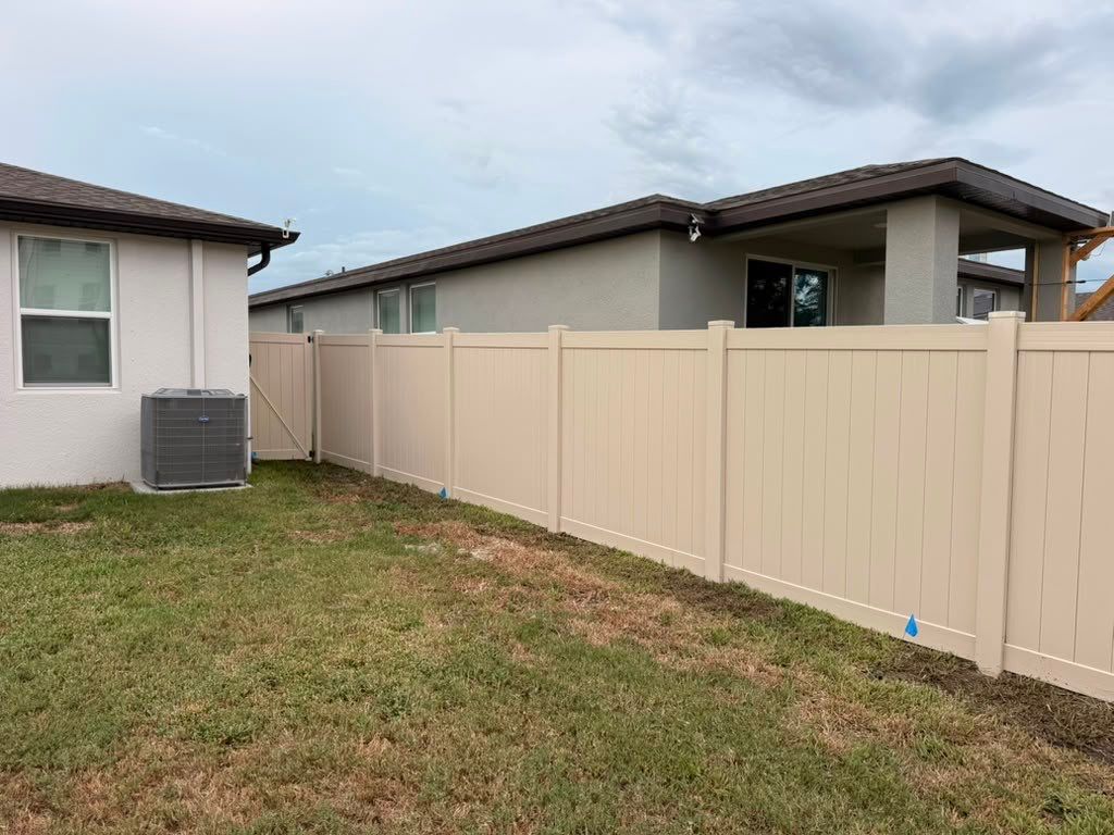 Tan Vinyl Privacy Fence Installation for Sarasota Home by True Fence LLC