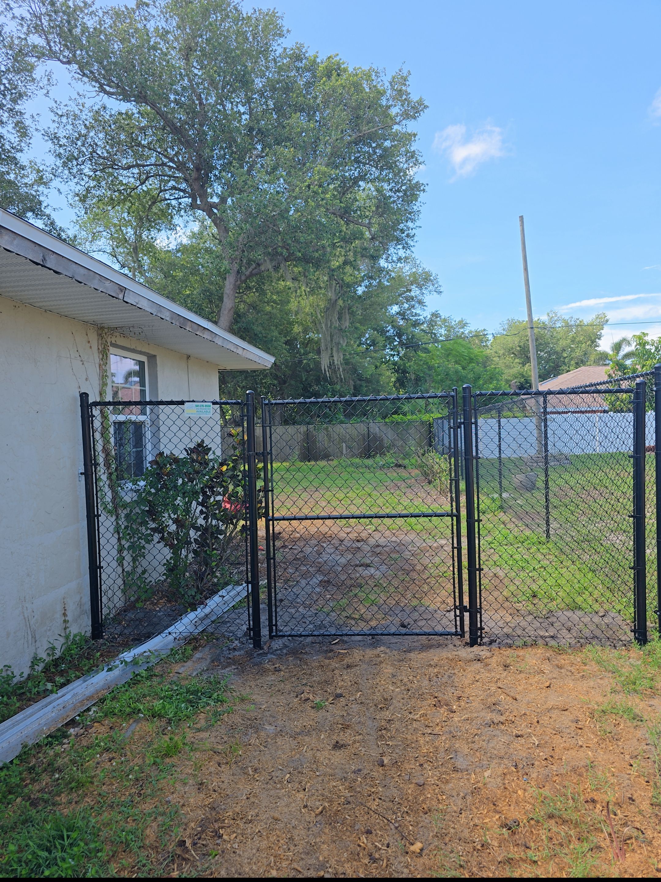 Black Chain Link in Port Charlotte by True Fence LLC