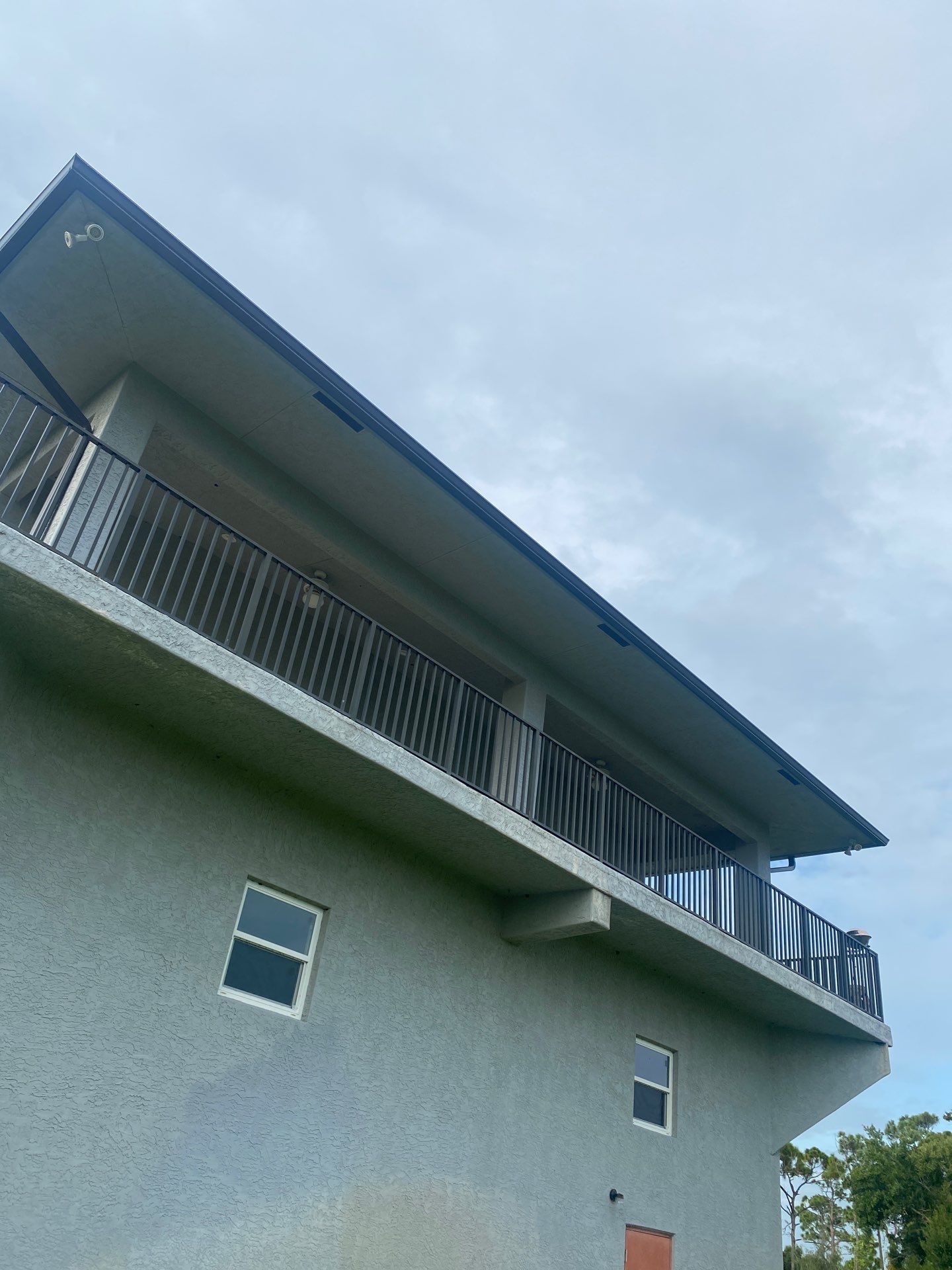 Black Seamless Gutters St. James City by Gutter Professors