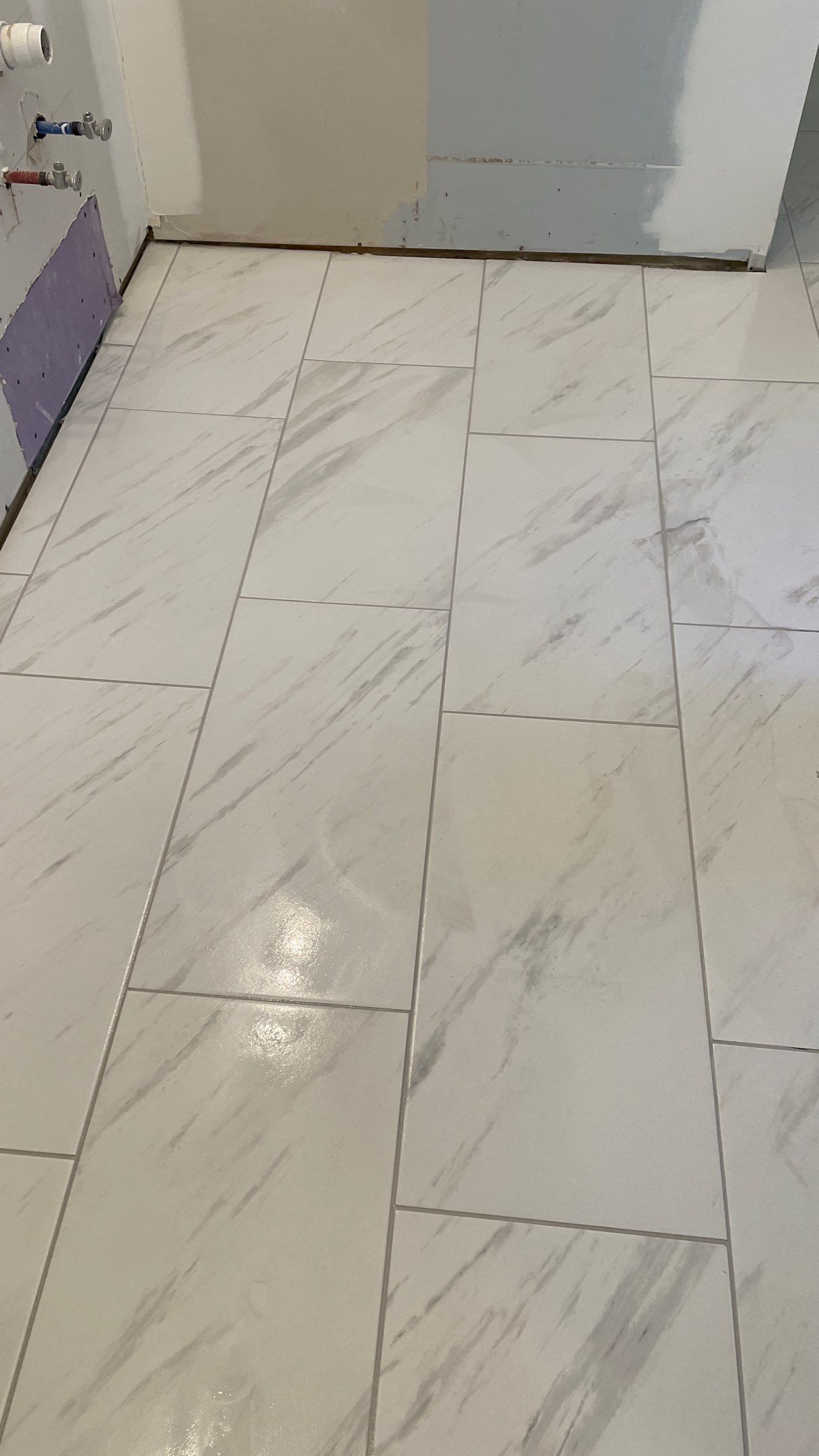 Bright Bathroom Remodel with Wall Removal, Stand Alone Tub and New Vanity by Footprints Floors of Coastal Carolina