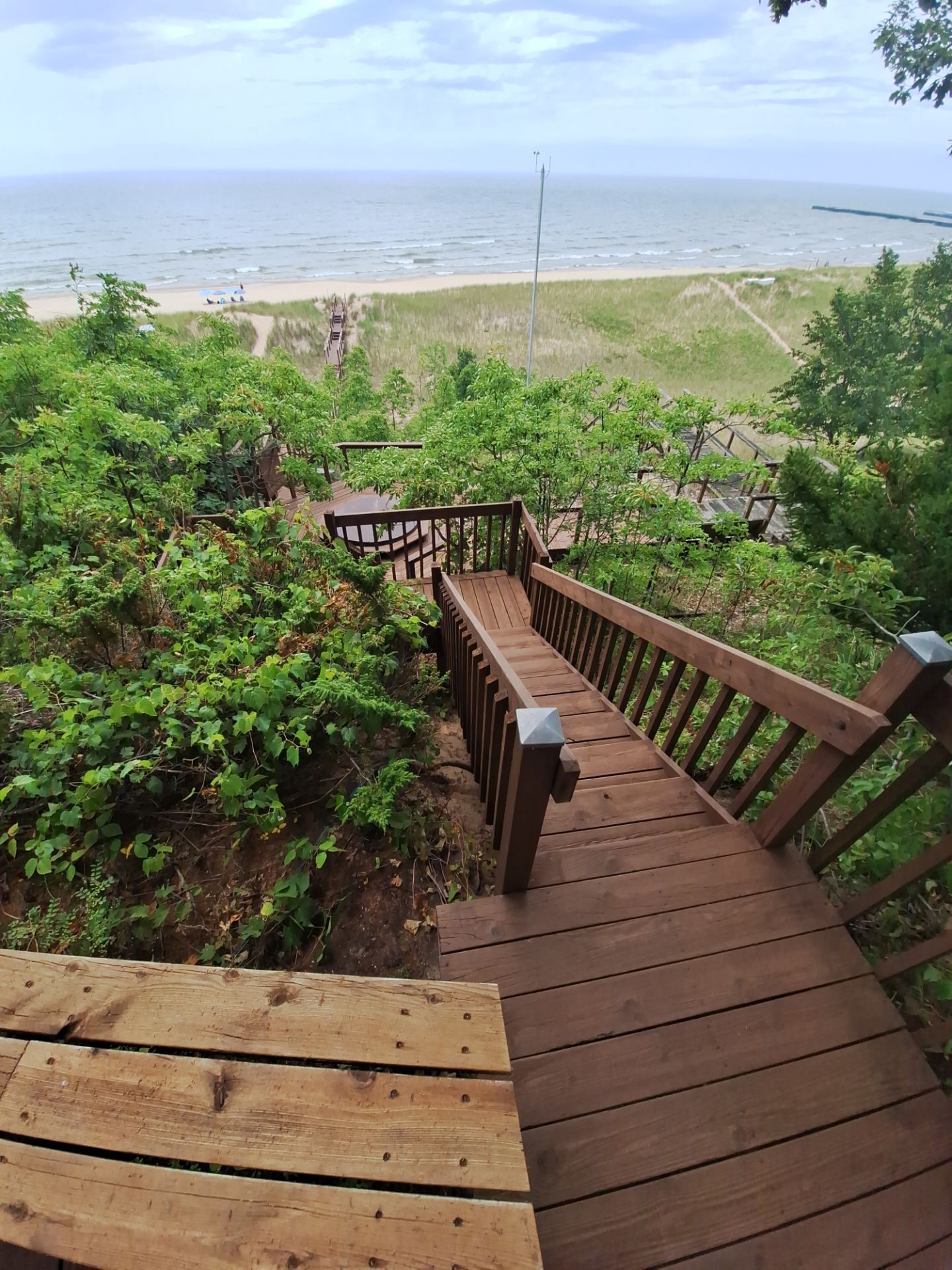 Lakefront Deck Pressure Washing, Exterior Wood Staining, and Painting in West Olive MI by Gordon Painting