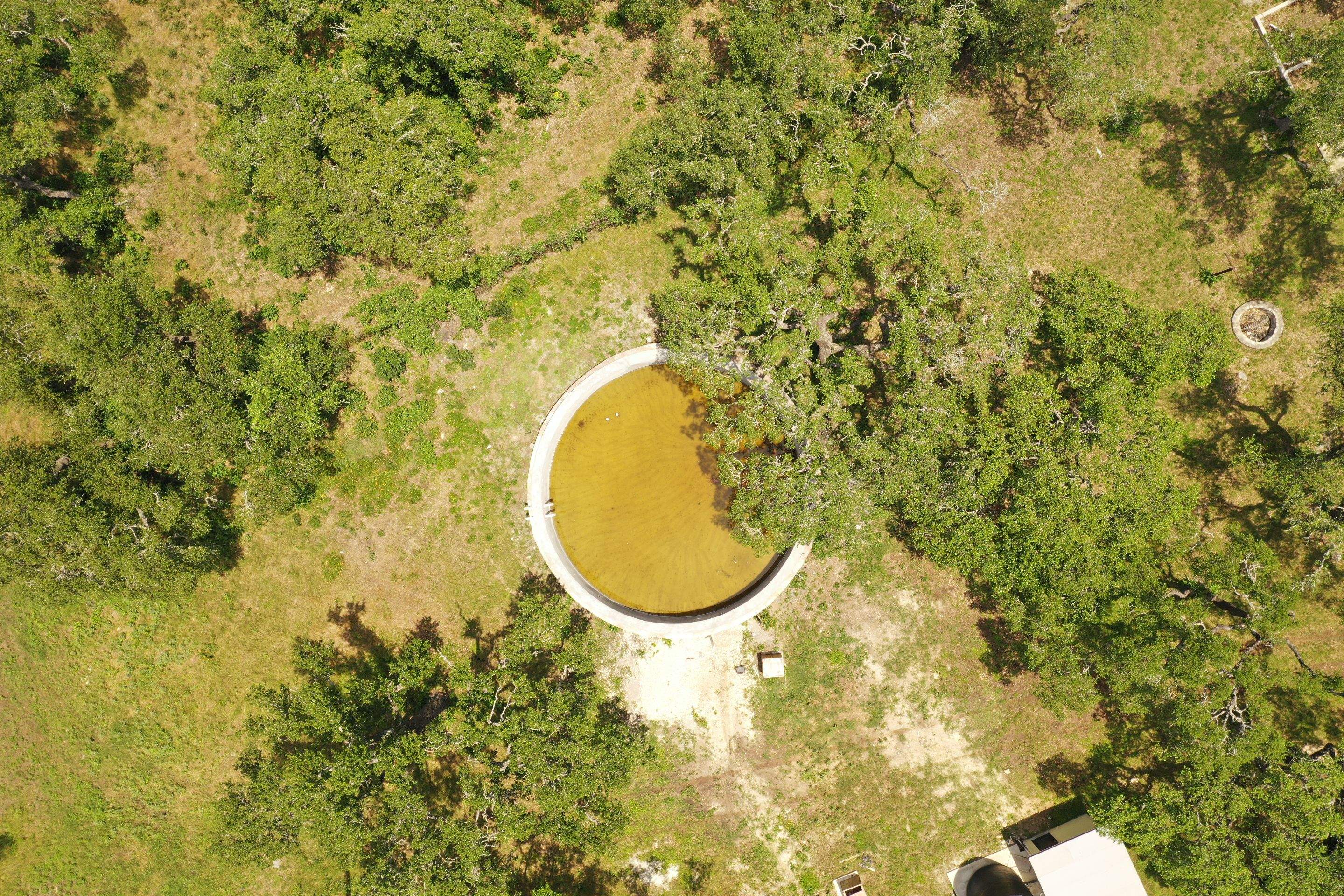 Restoration of 65k gallon Cattle Watering Tank by Hill Country Rain Water