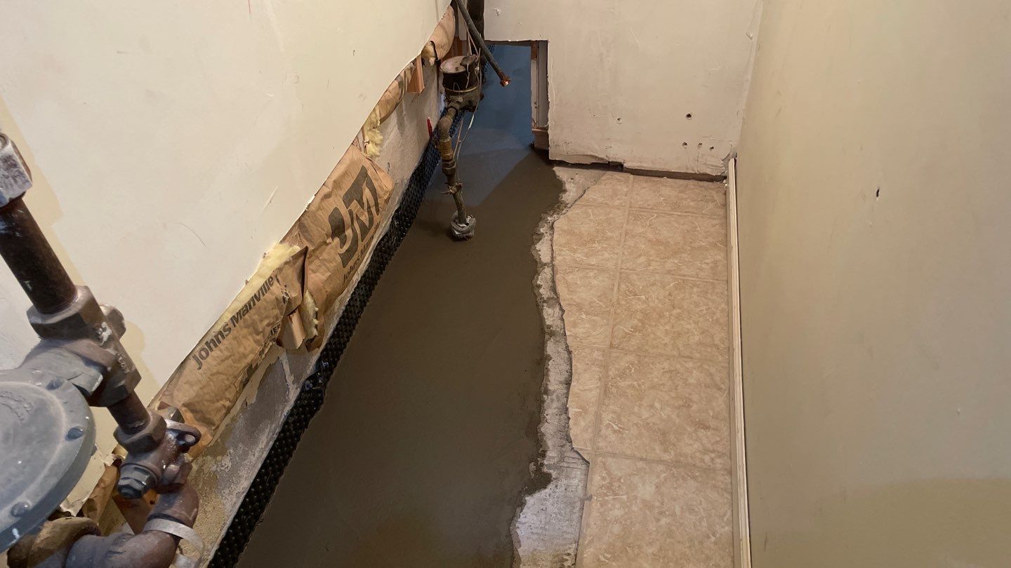Drain Tile in Minneapolis for Kristen & Taylor by Waterproofing Northeast