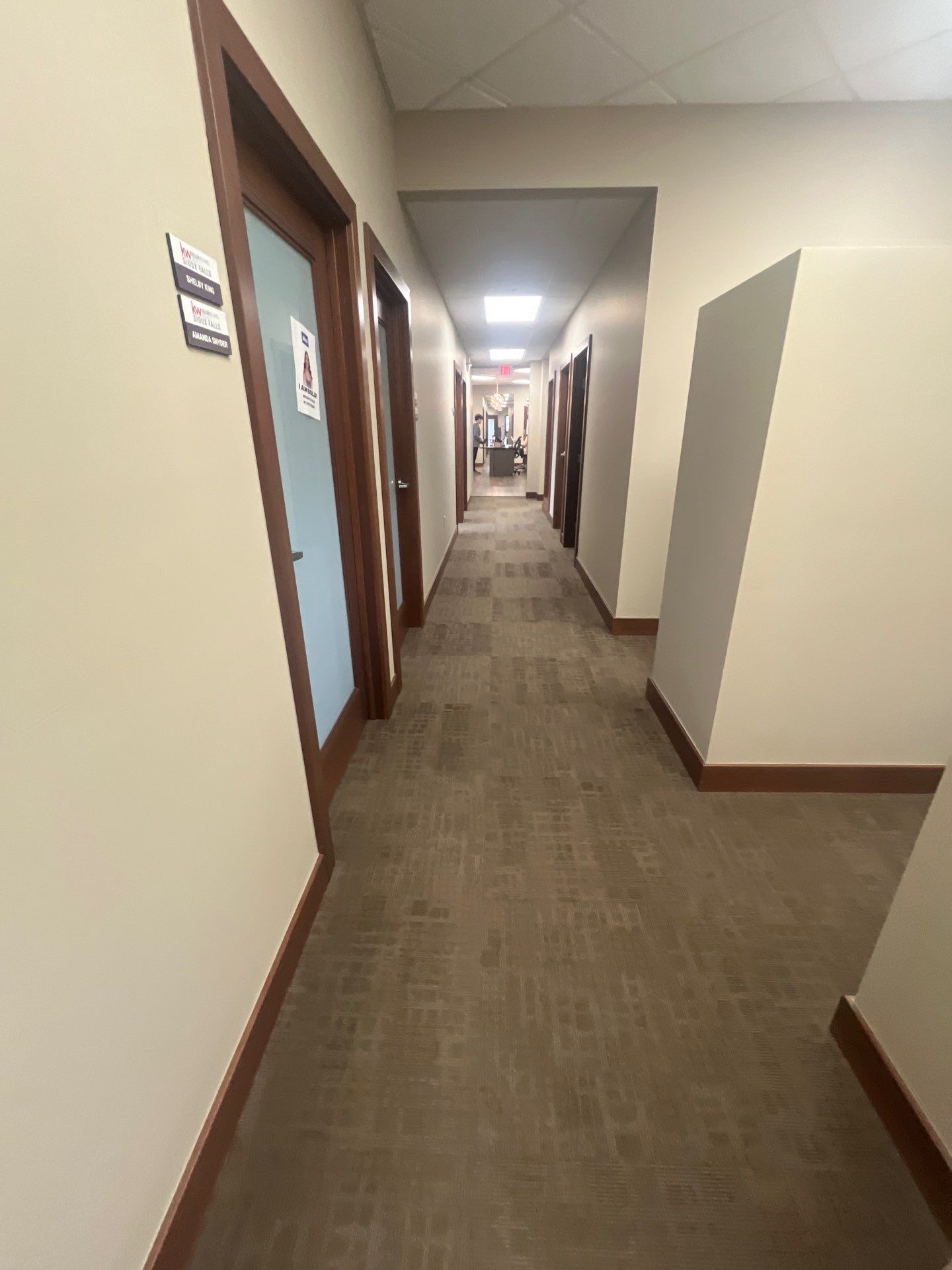 Commercial Office Interior Remodel and Modern Suite Refresh in Sioux Falls by Select Painting, Coatings & Garage Cabinets