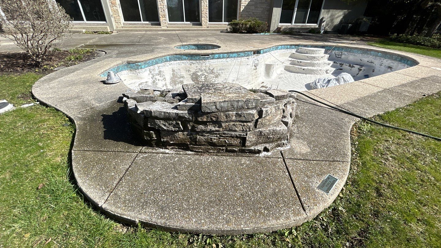 Aggregate Clean and seal using low gloss sealer by Northern Power Washing LLC.