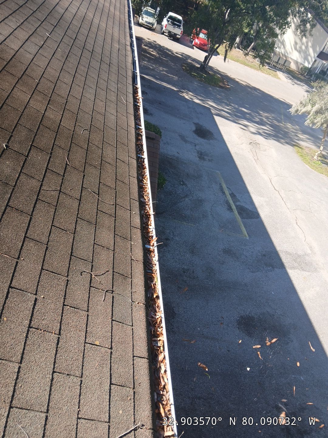 Commercial gutter cleaning South Carolina before photo with filled gutters
