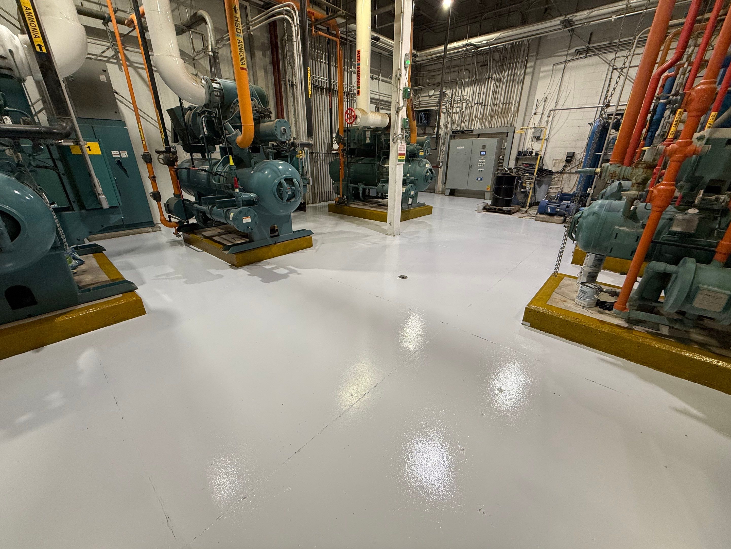 Industrial Epoxy Floor Coating for Perdue Premium Meat Co in Sioux Center by Select Painting, Coatings & Garage Cabinets