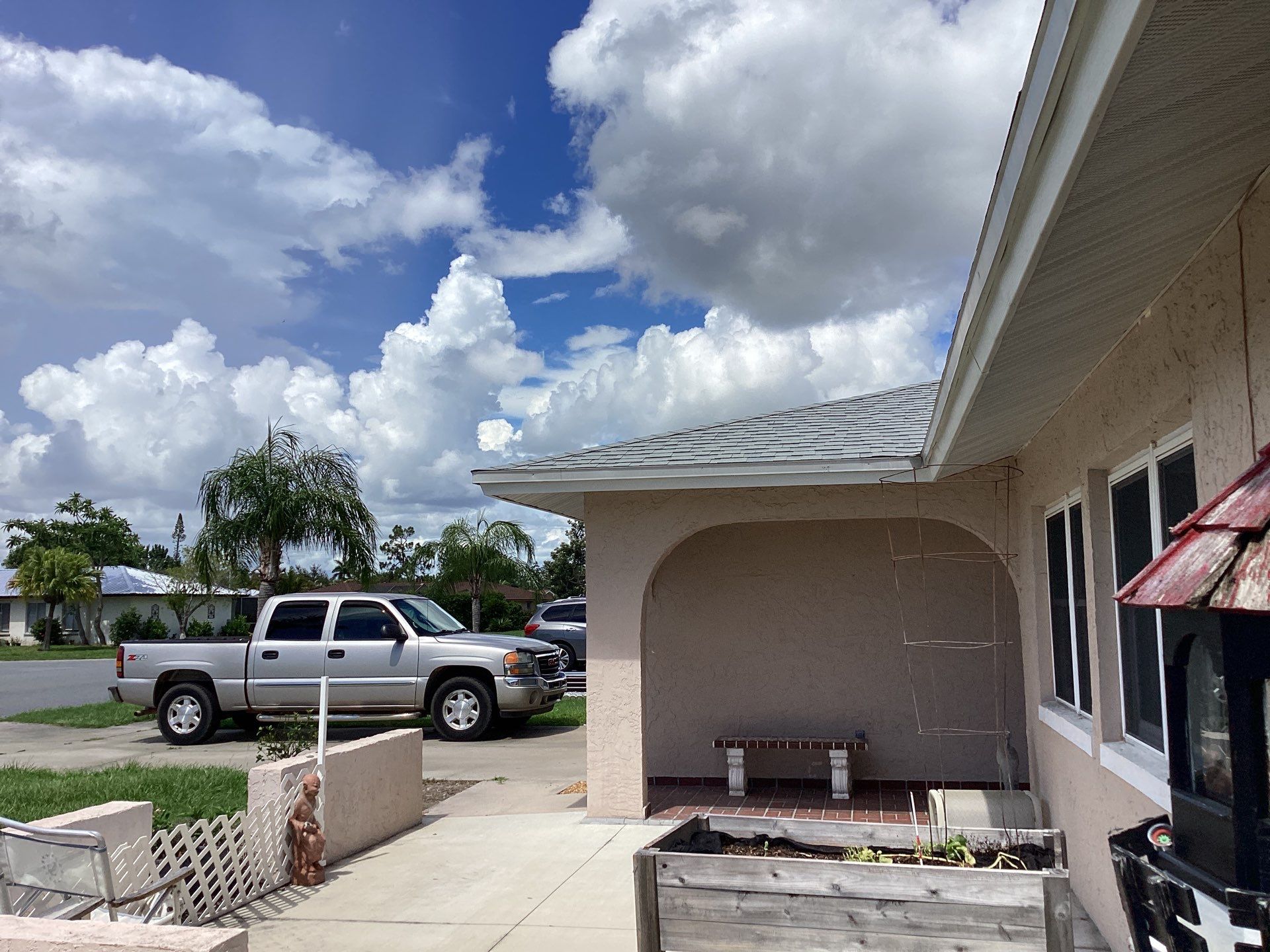 White Seamless Gutters and Splash Guards in Fort Myers FL by Gutter Professor by Gutter Professors