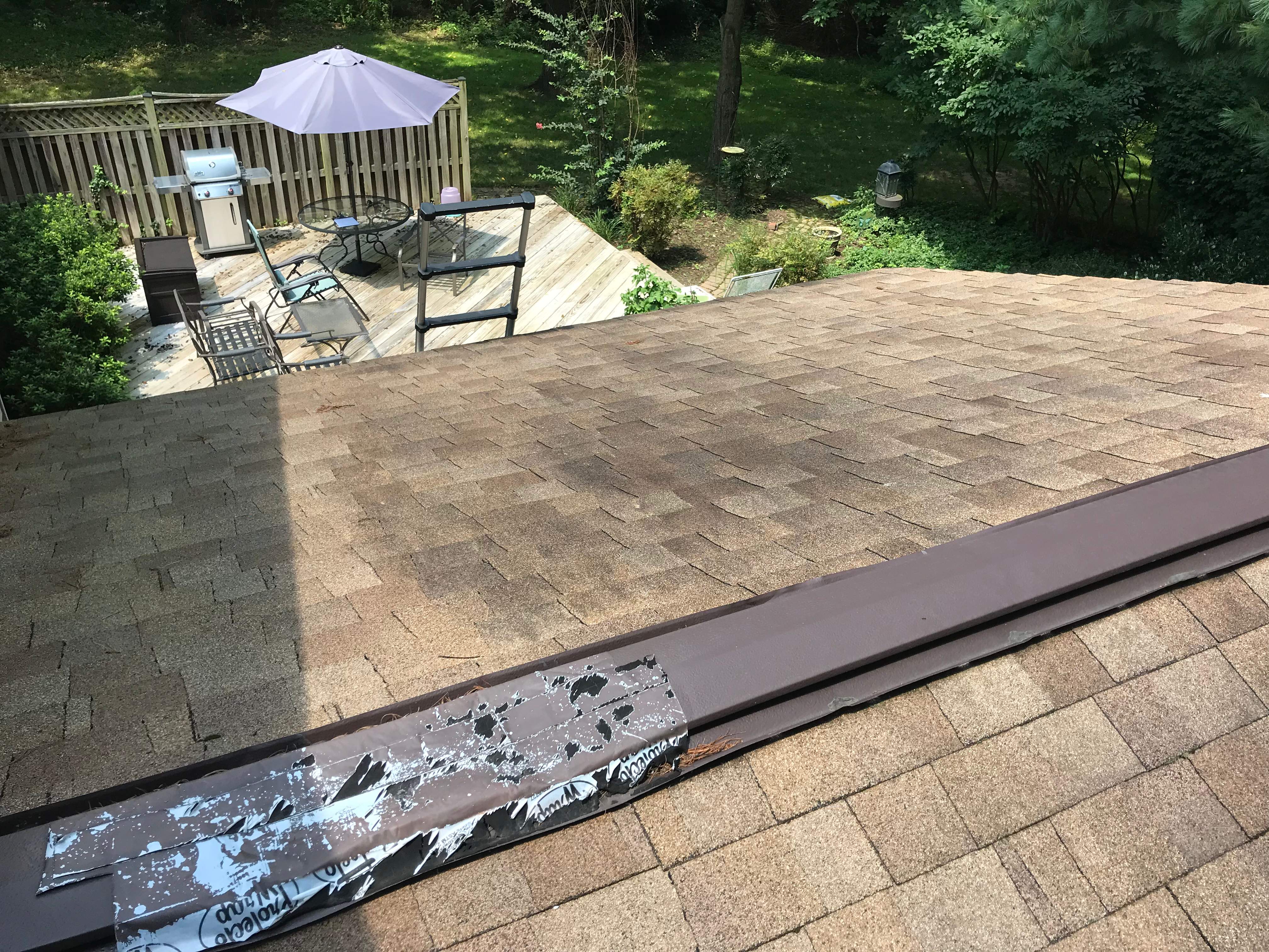 Residential Roofing Installation using Landmark Shingles Color Weatherwood by Alpha Design Services