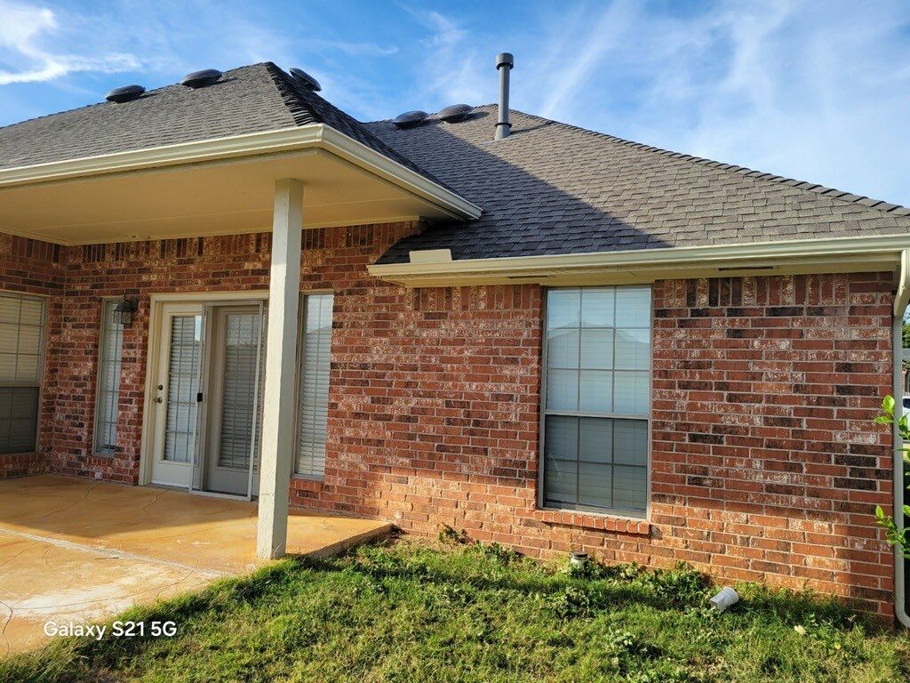 Roof Replacement and Gutter Installment in Edmond, OK by McCann's Roofing and Construction