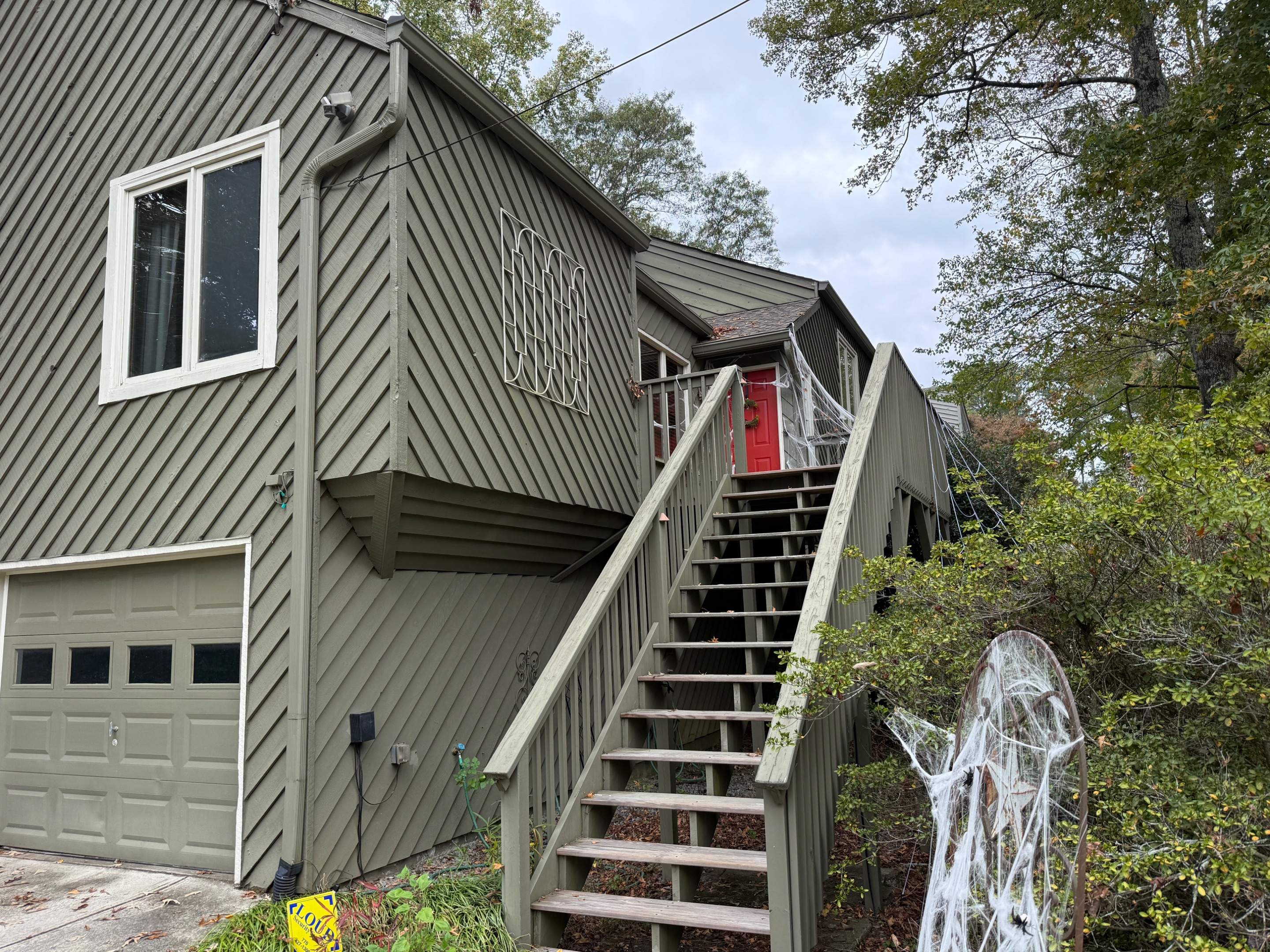Elevated Wood Deck and Siding Replacement in Marietta by Swift Home Renovations