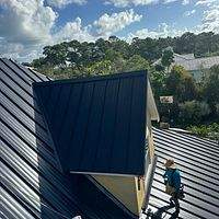 24ga 1.5" Mechanical Seam Matte Black  by Total Roofing System The Metal Roof Experts