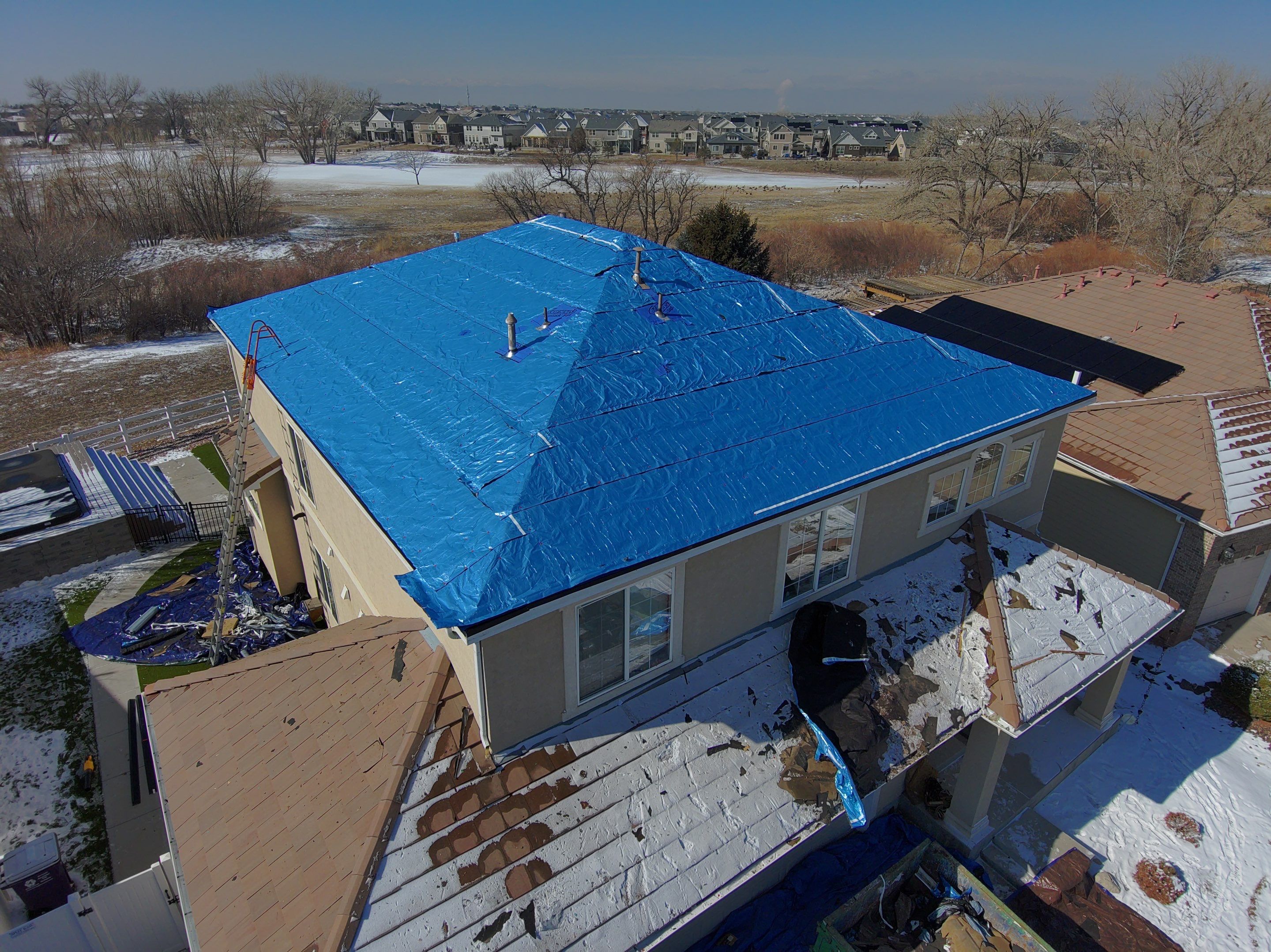 Residential Roofing Installation using Stone Coated Steel Cottage Shake by Blue Peaks Roofing LLC 
