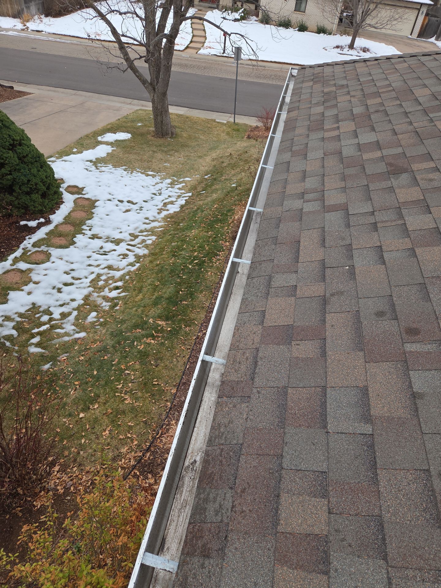   Gutters and Downspout Cleaning by RTP Roofing Company