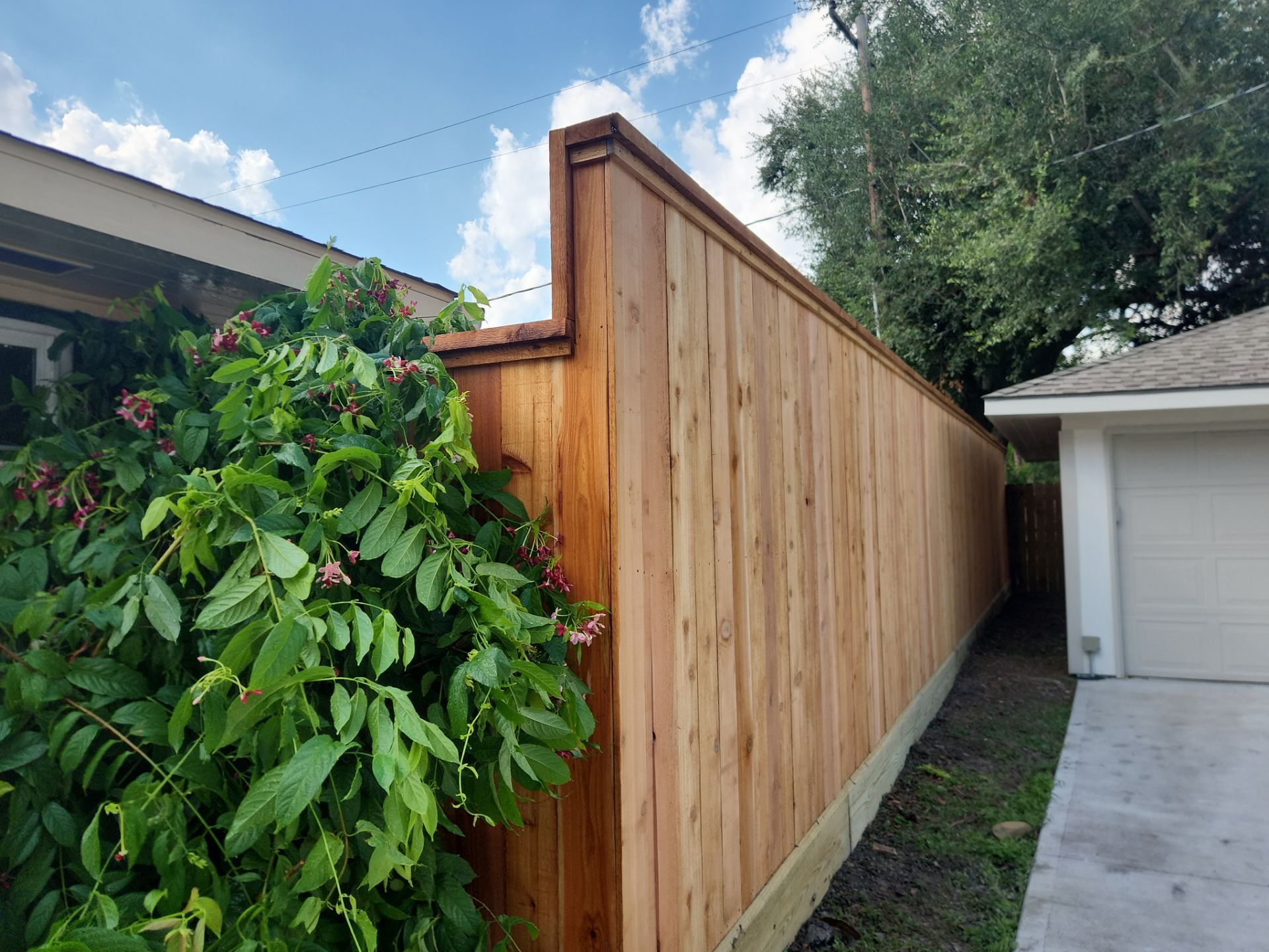 8ft Tall wood fence installation by Tim's Fences