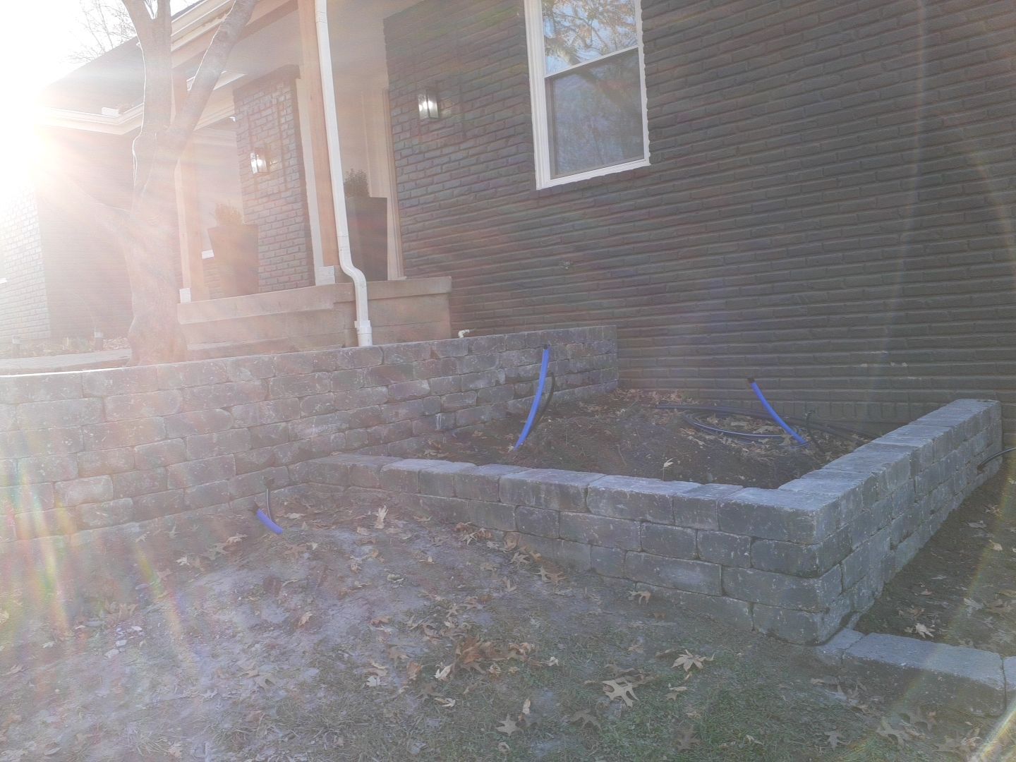Entire Home Landscape and Retaining Walls by LAND ESCAPES LLC