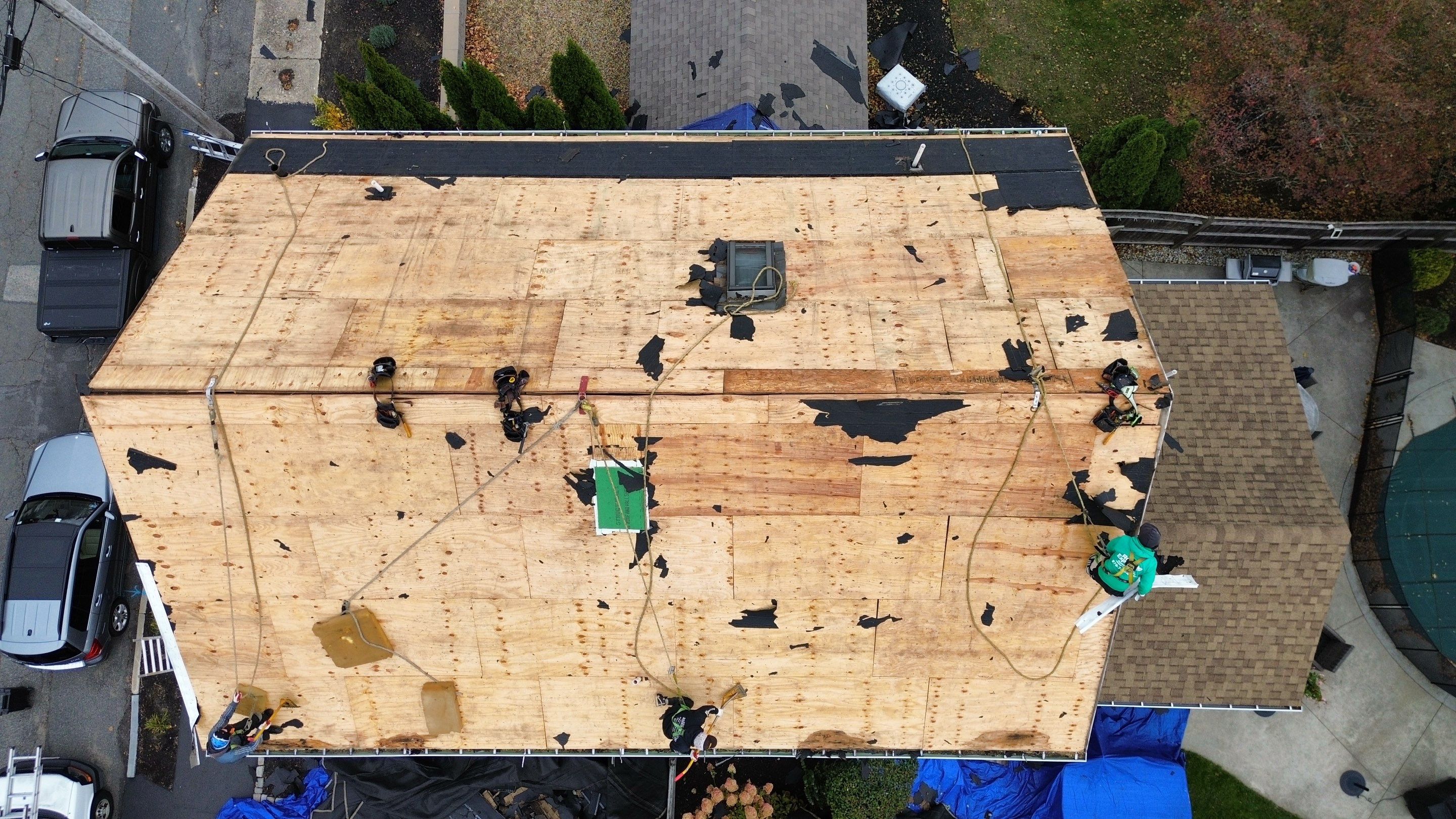 Newburyport Complete Roof Replacement with Solar Venting Skylight by Mighty Dog Roofing of Greater Middlesex County