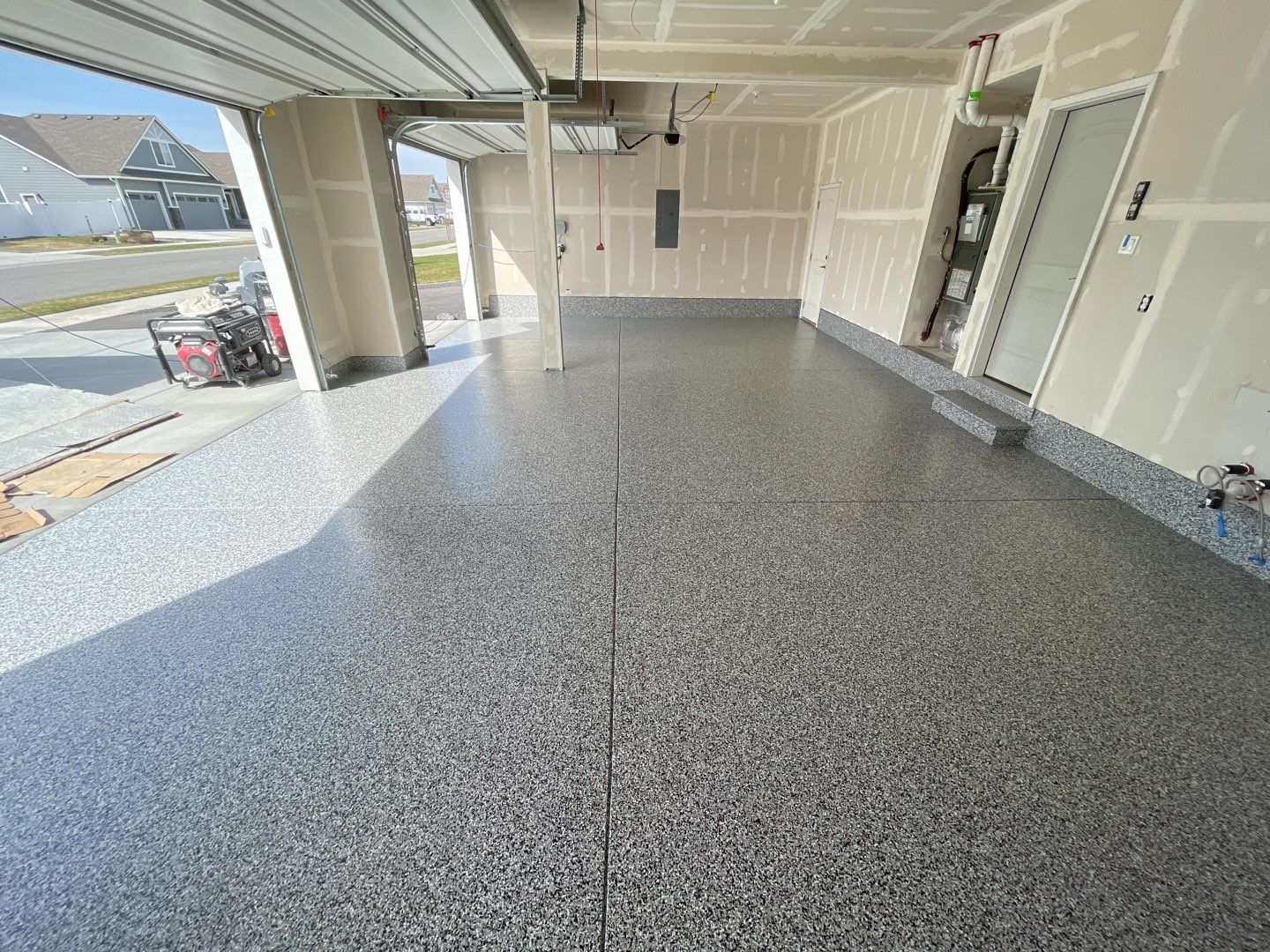 Garage Transformation using Domino by Croc Coatings, LLC