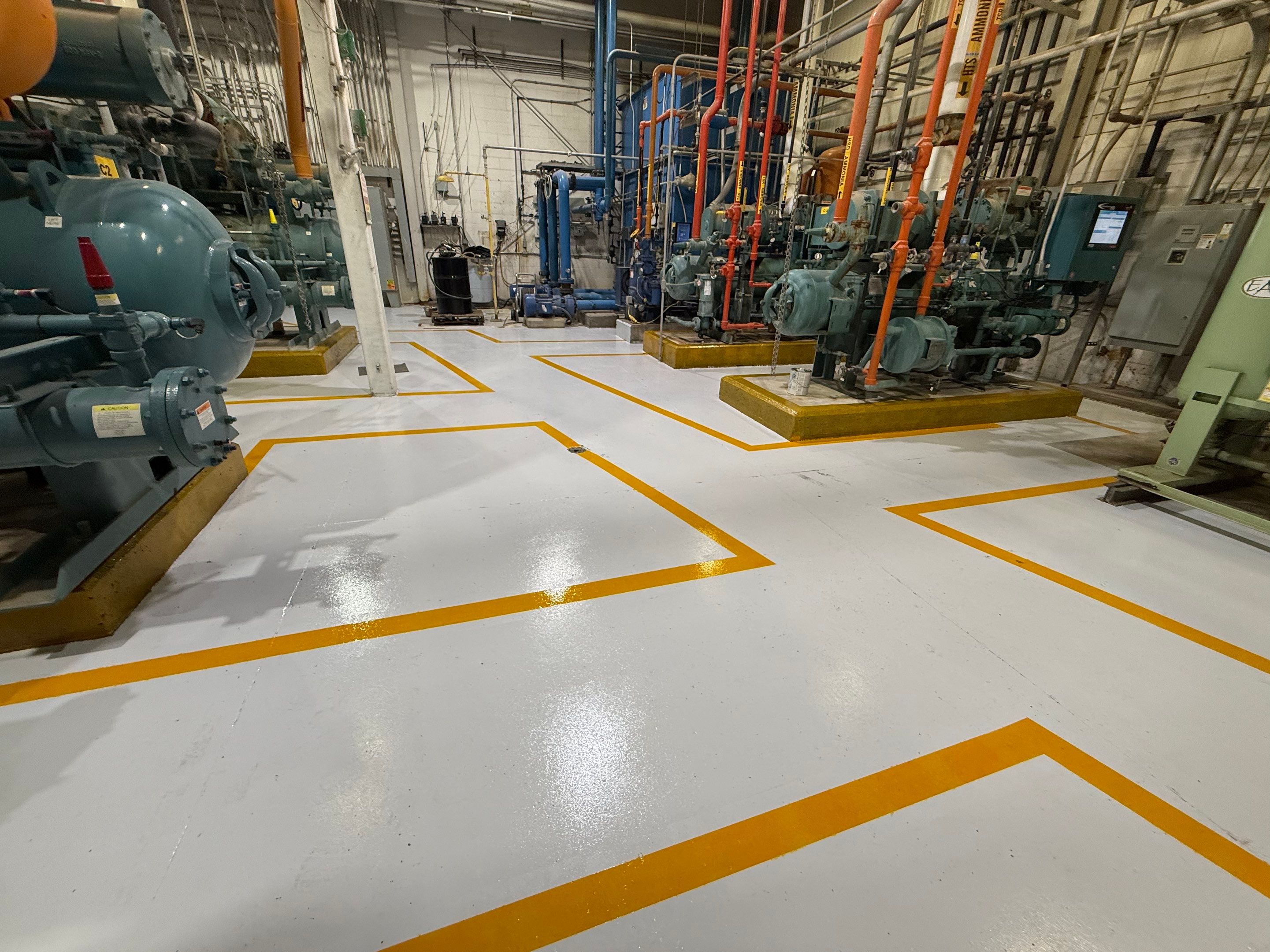 Industrial Epoxy Floor Coating for Perdue Premium Meat Co in Sioux Center by Select Painting, Coatings & Garage Cabinets