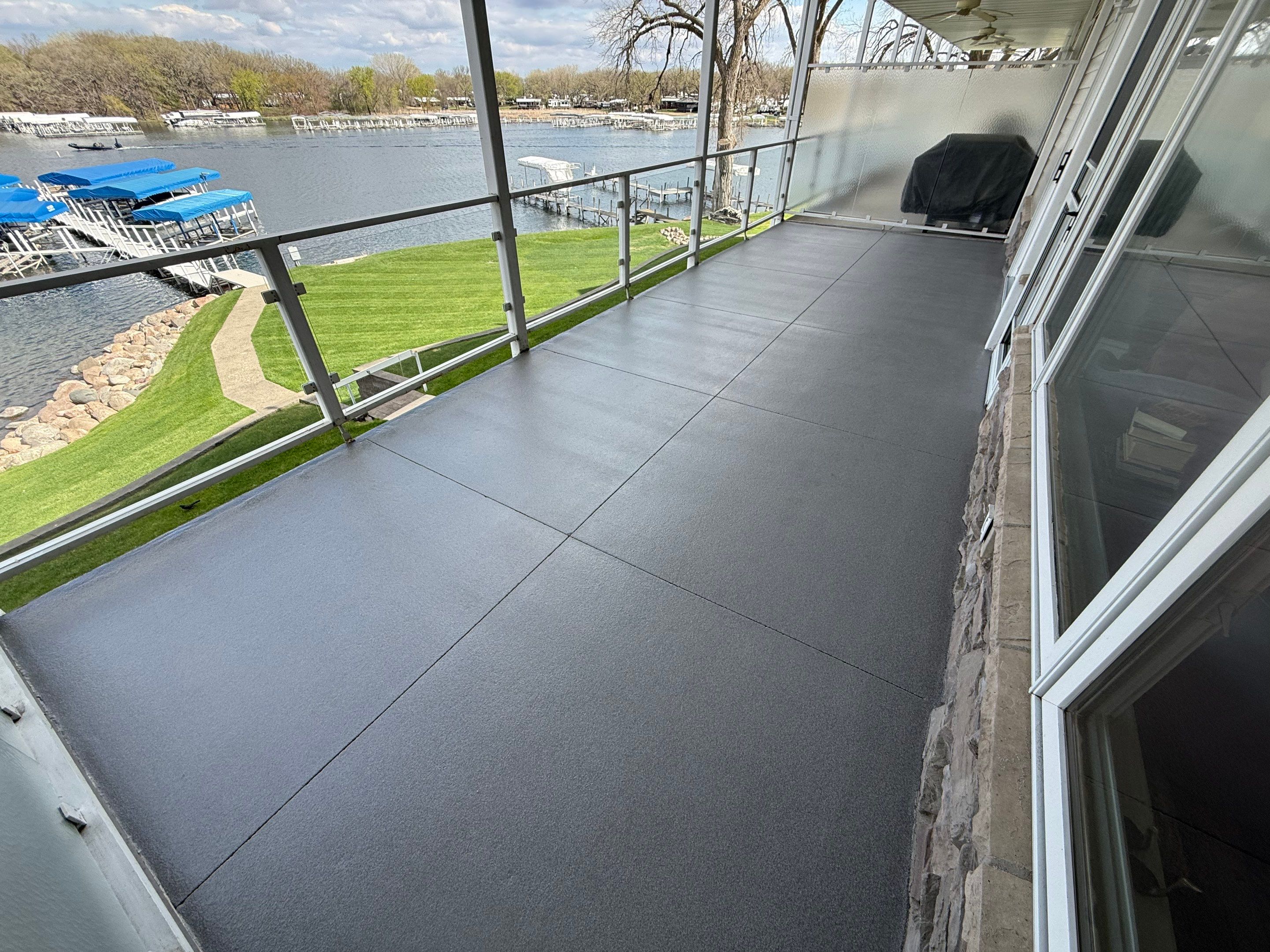 Dark Gray Slip-Resistant Concrete Coating for Arnolds Park Balcony by Select Painting, Coatings & Garage Cabinets