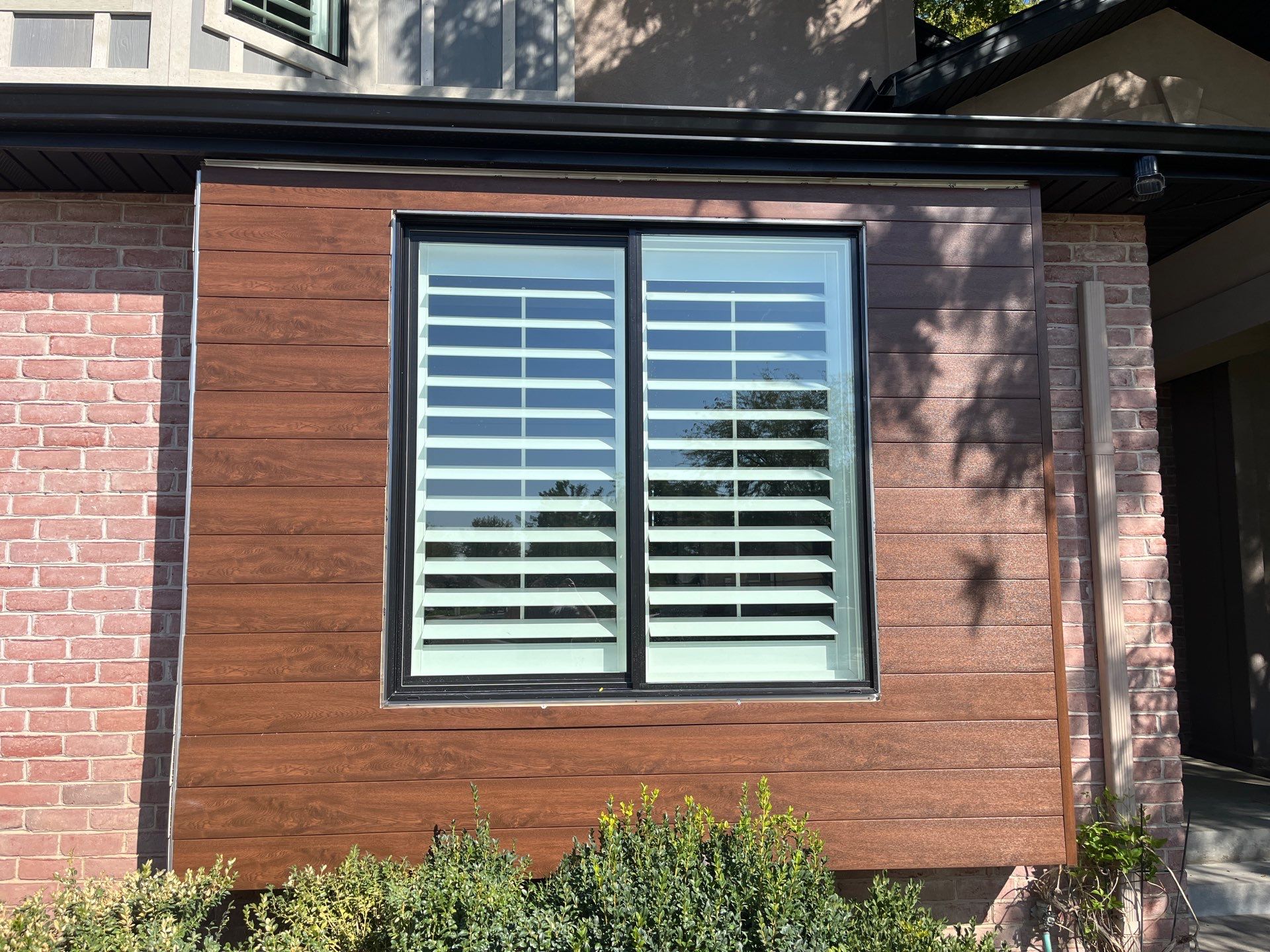 Centerville | High-End Stucco Conversion Accent | Walnut Cedar & Primed B&B by Ideal Siding Utah