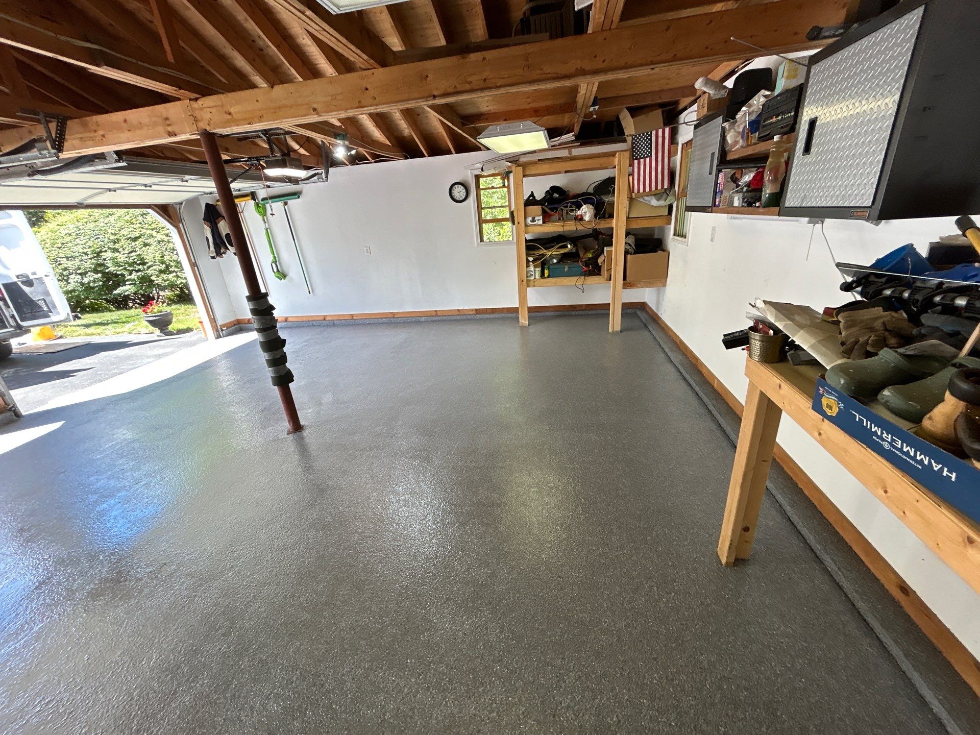 Garage in Londonderry, NH 03053 by Symphony Concrete Coatings