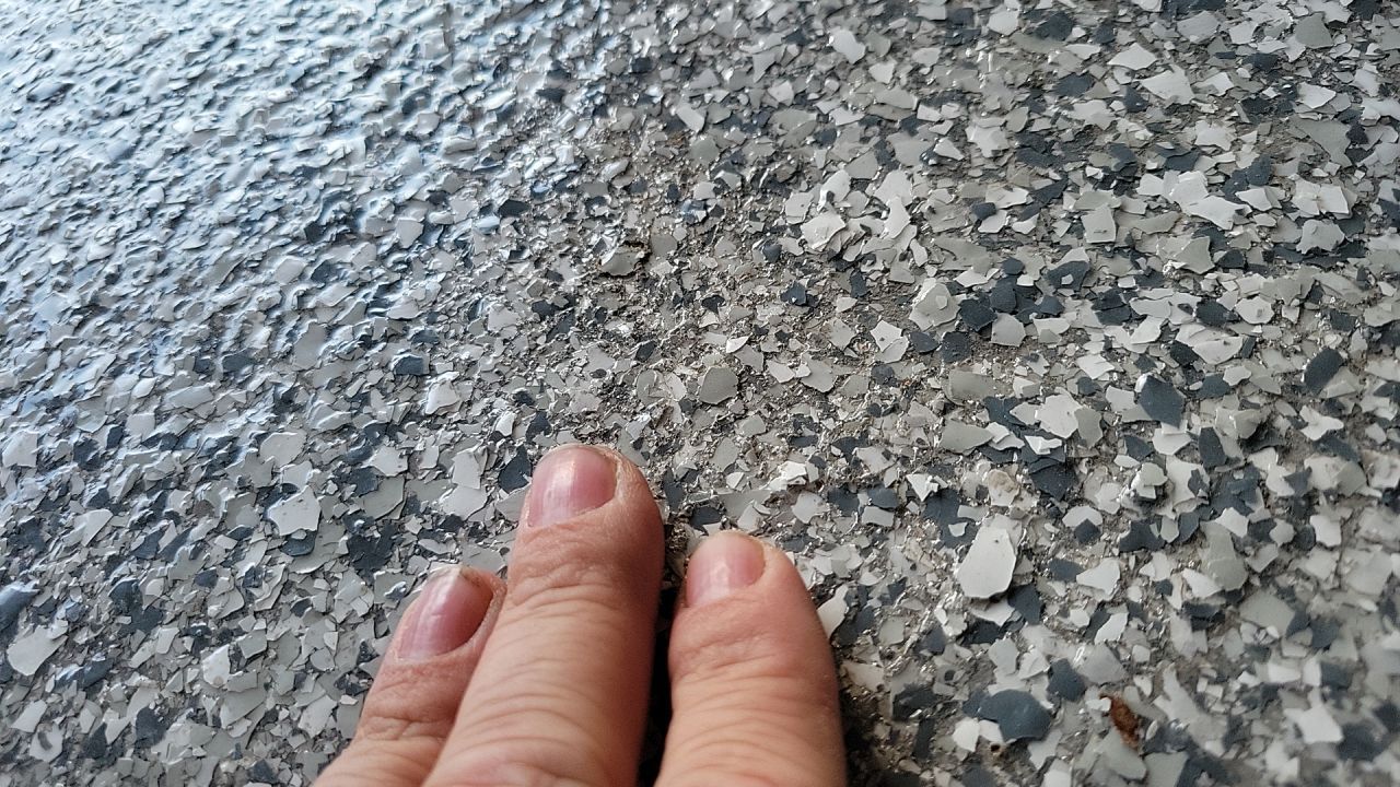 Fasciano Basement & Garage TransFLOORmation by Symphony Concrete Coatings