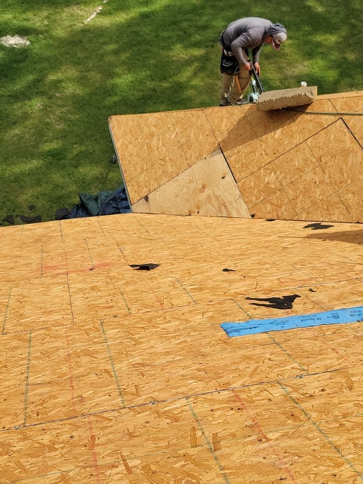 Residential Roofing Installation using Roof Replacement by American Roofing & Construction LLC