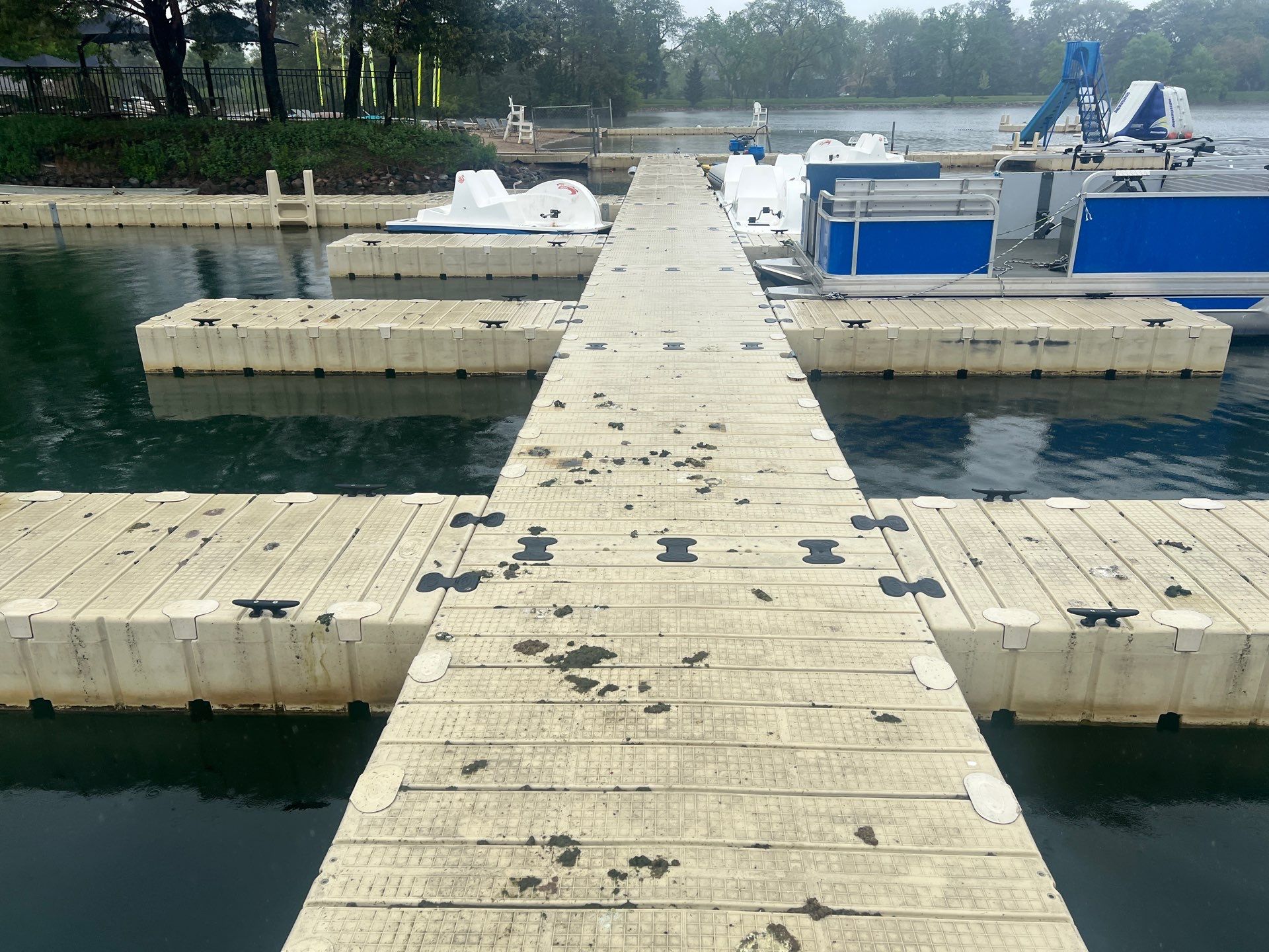Power washing of floating dock by Northern Power Washing LLC.