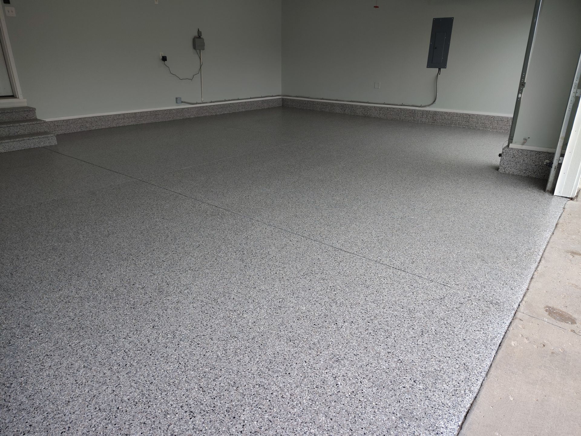 New Garage Floor Transformation in Ankeny by Revival Concrete Coatings