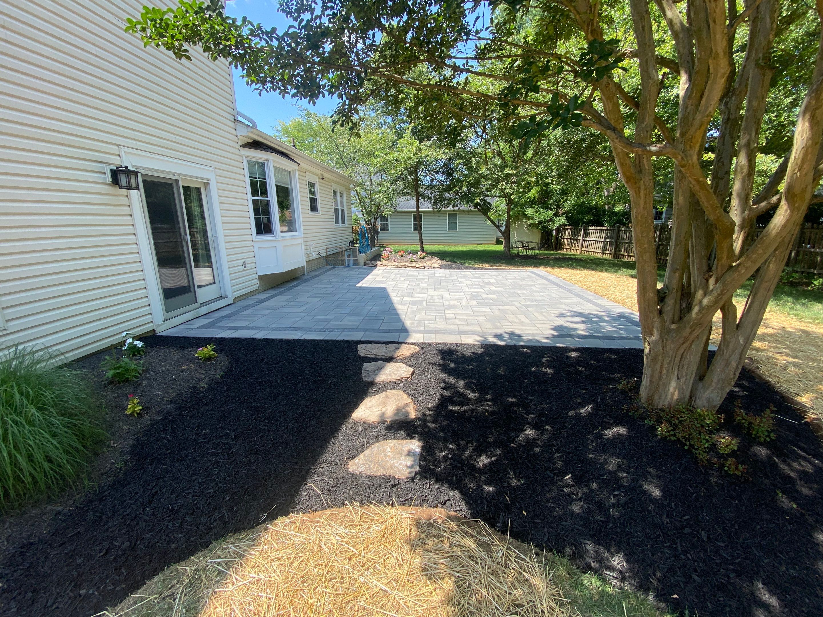 Backyard Transformation using Techo-Bloc Pavers by The Smet Companies, LLC