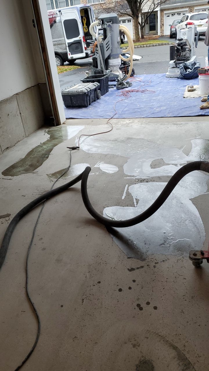 Garage Floor Coating using Penntek  by Spectrum Painting, LLC