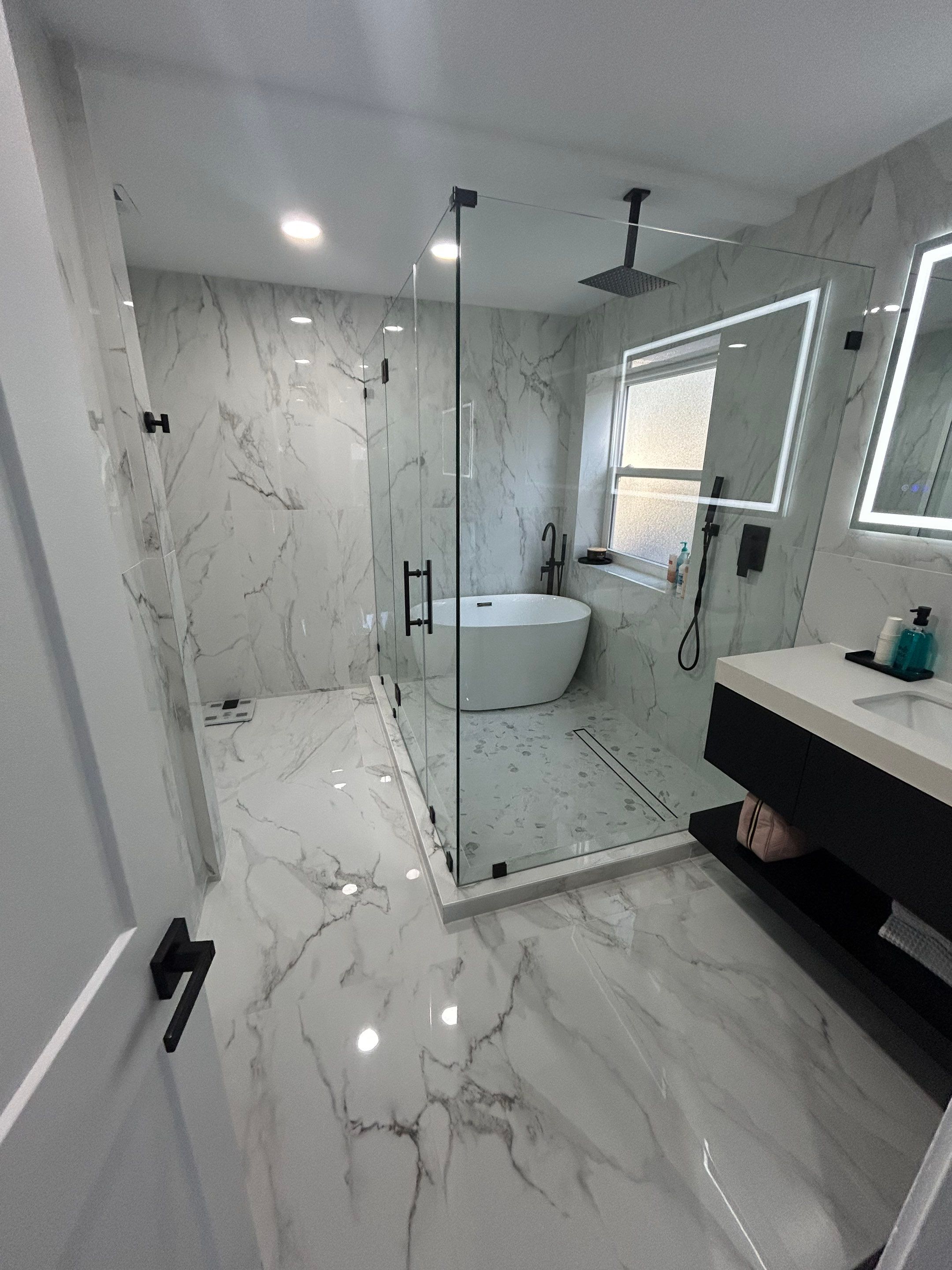 Master Bathroom, Children's Bathroom, and Fireplace Renovation by urban green energy llc