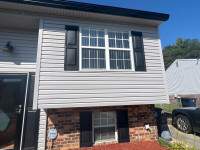 Shutters using Mid America Raised Panel by ExteriorPros