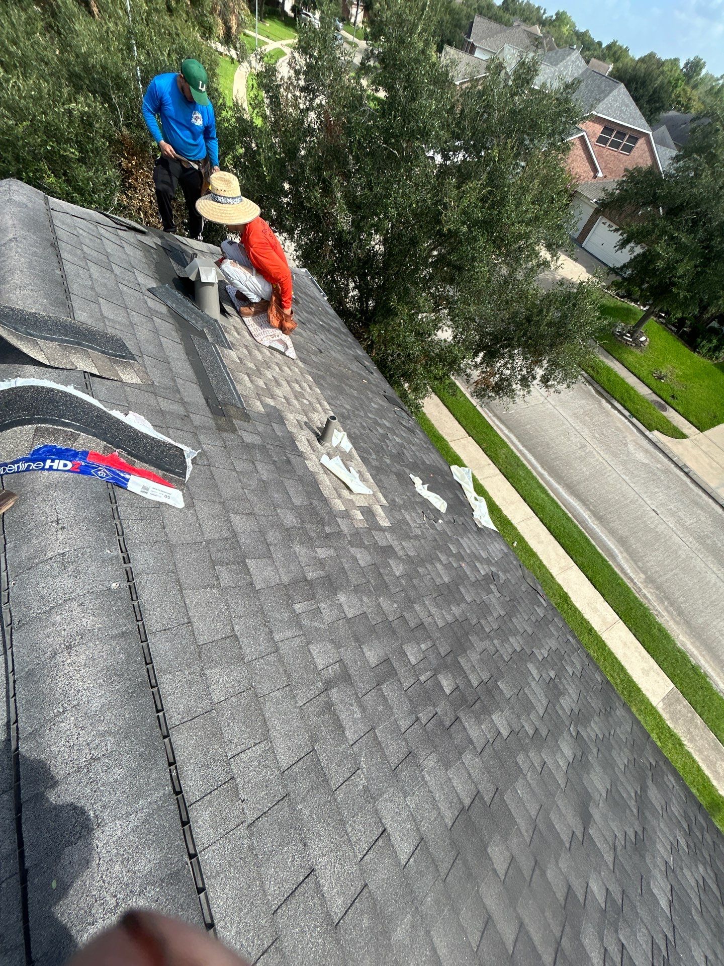 Hail Damage using Owen's Corning Duration (Lifetime) Shingles by Roof Repair Company