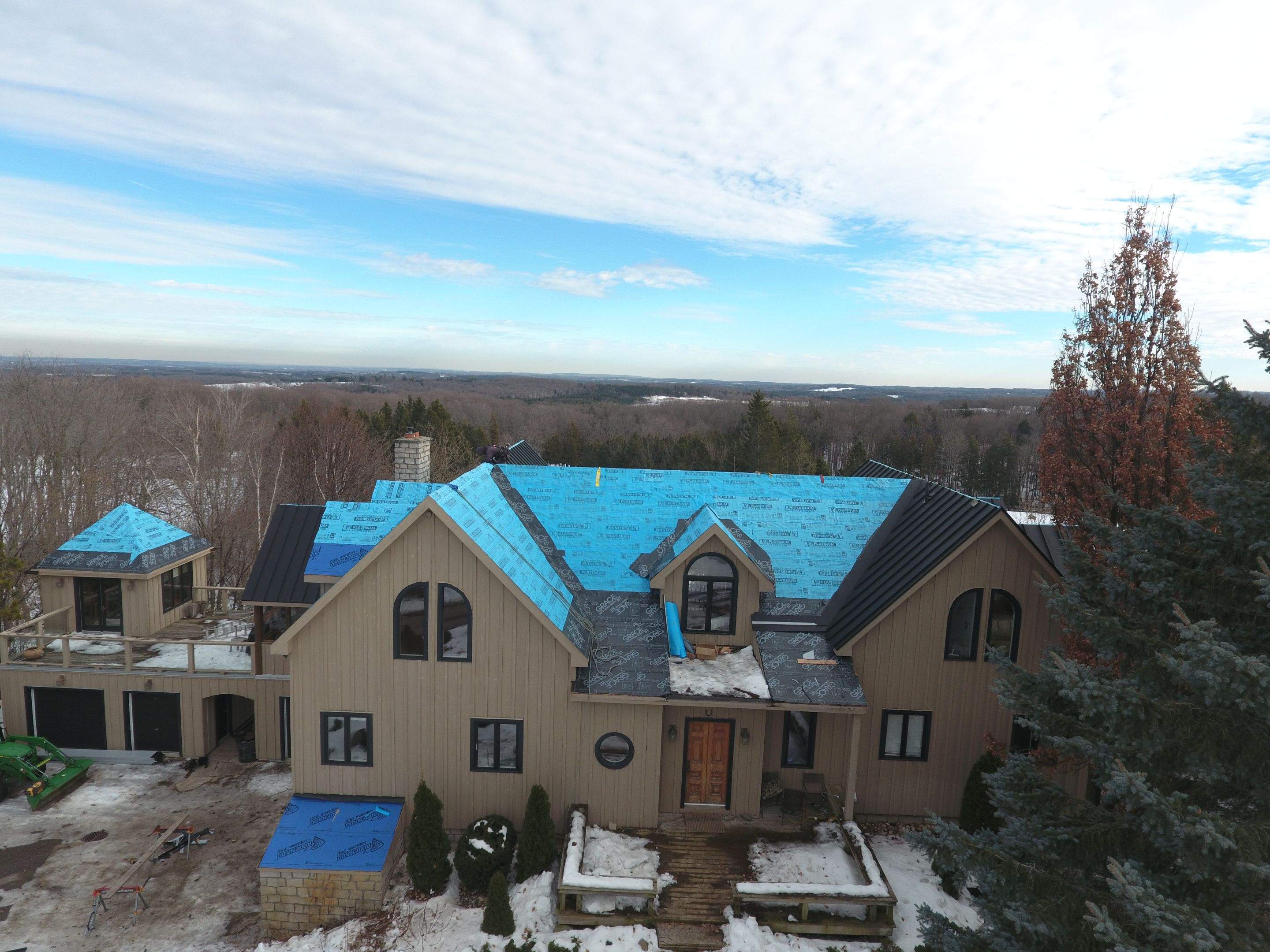 Residential Roofing Installation using 24 Ga Standing Seam Metal by Jay Carter Roofing & Sheet Metal