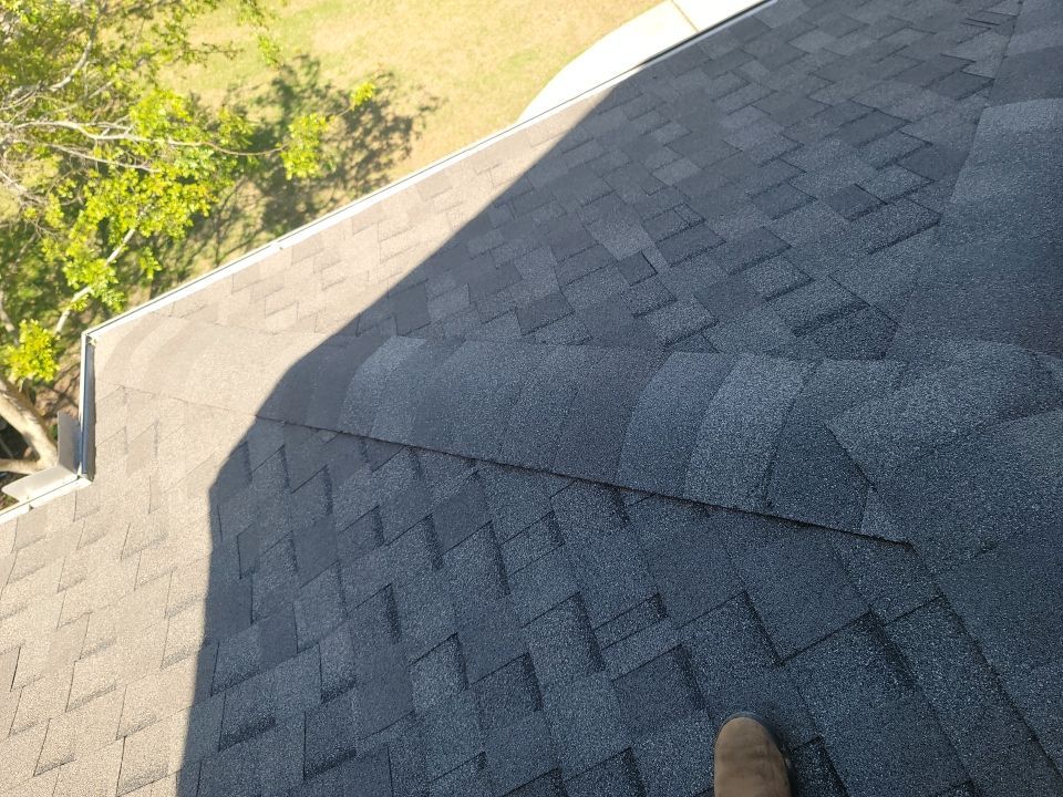 Residential Roofing Installation using Roof Replacement by American Roofing & Construction LLC