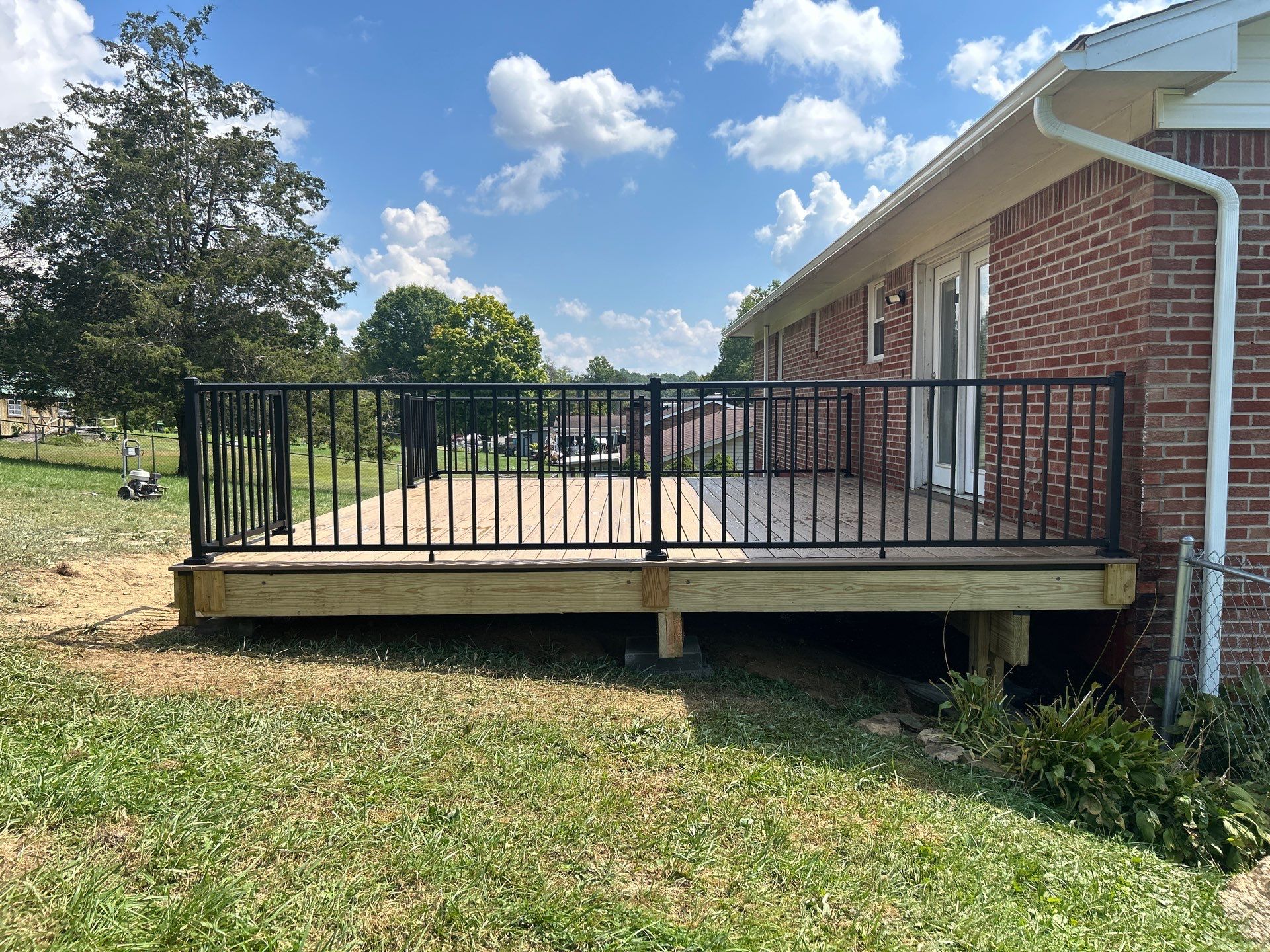 Composite Deck Replacement and Metal Railing Installation in Beckley by Walnut Hollow Decks & Outdoor Living