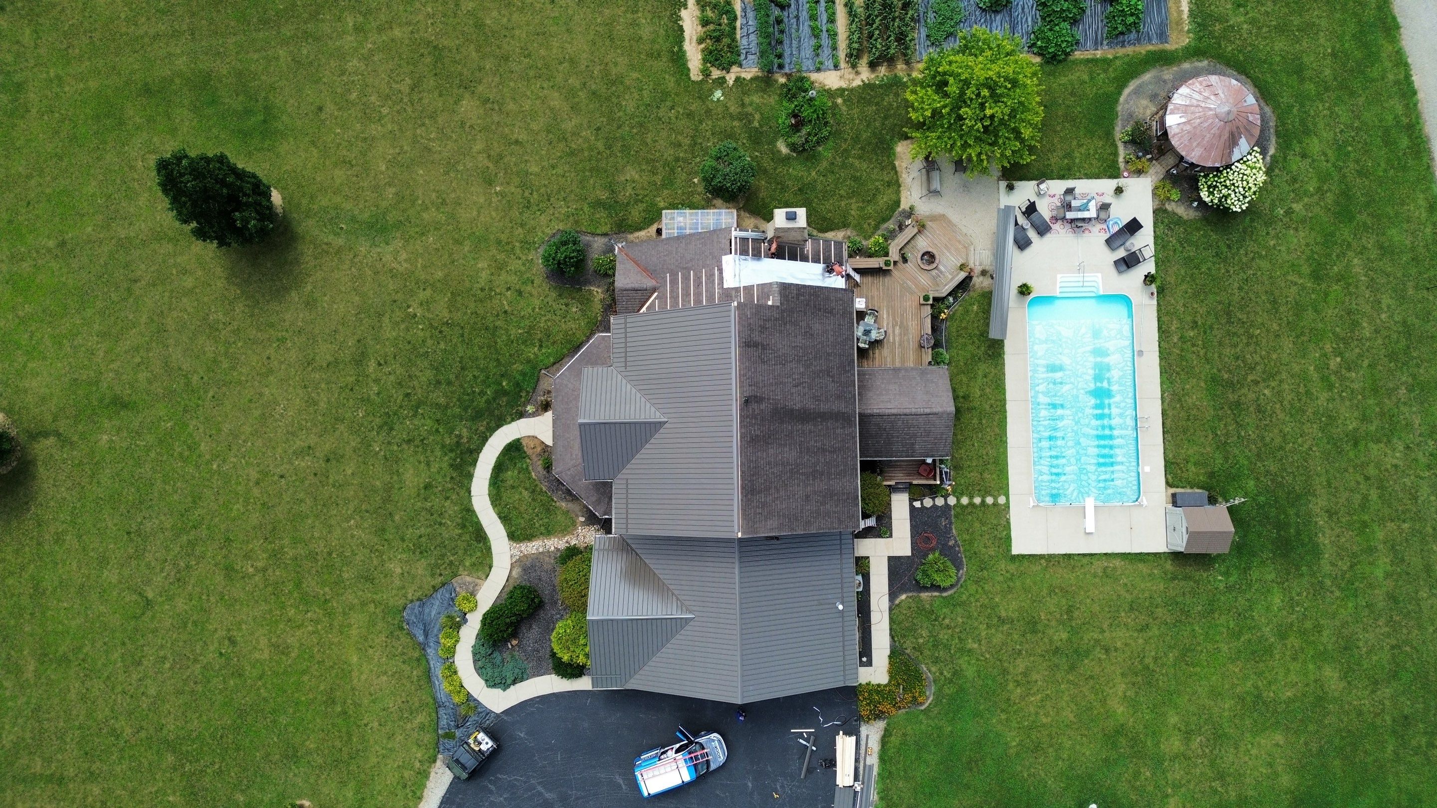 Residential Roofing Installation using Performance Panel Metal - Burnished Slate by RoofX 