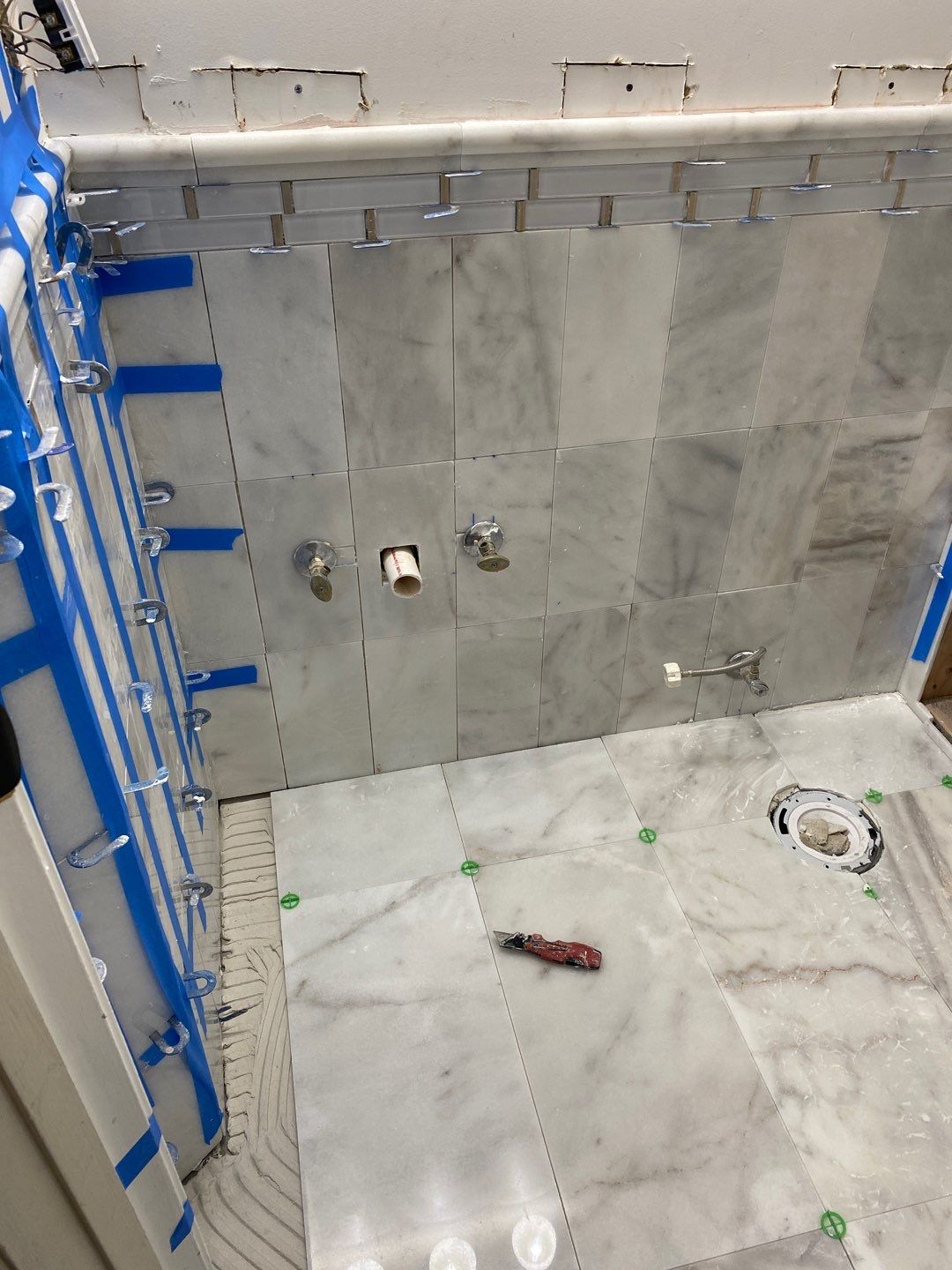 Bathroom Remodel using Two new bathroom design and new floors by Alpha Design Services