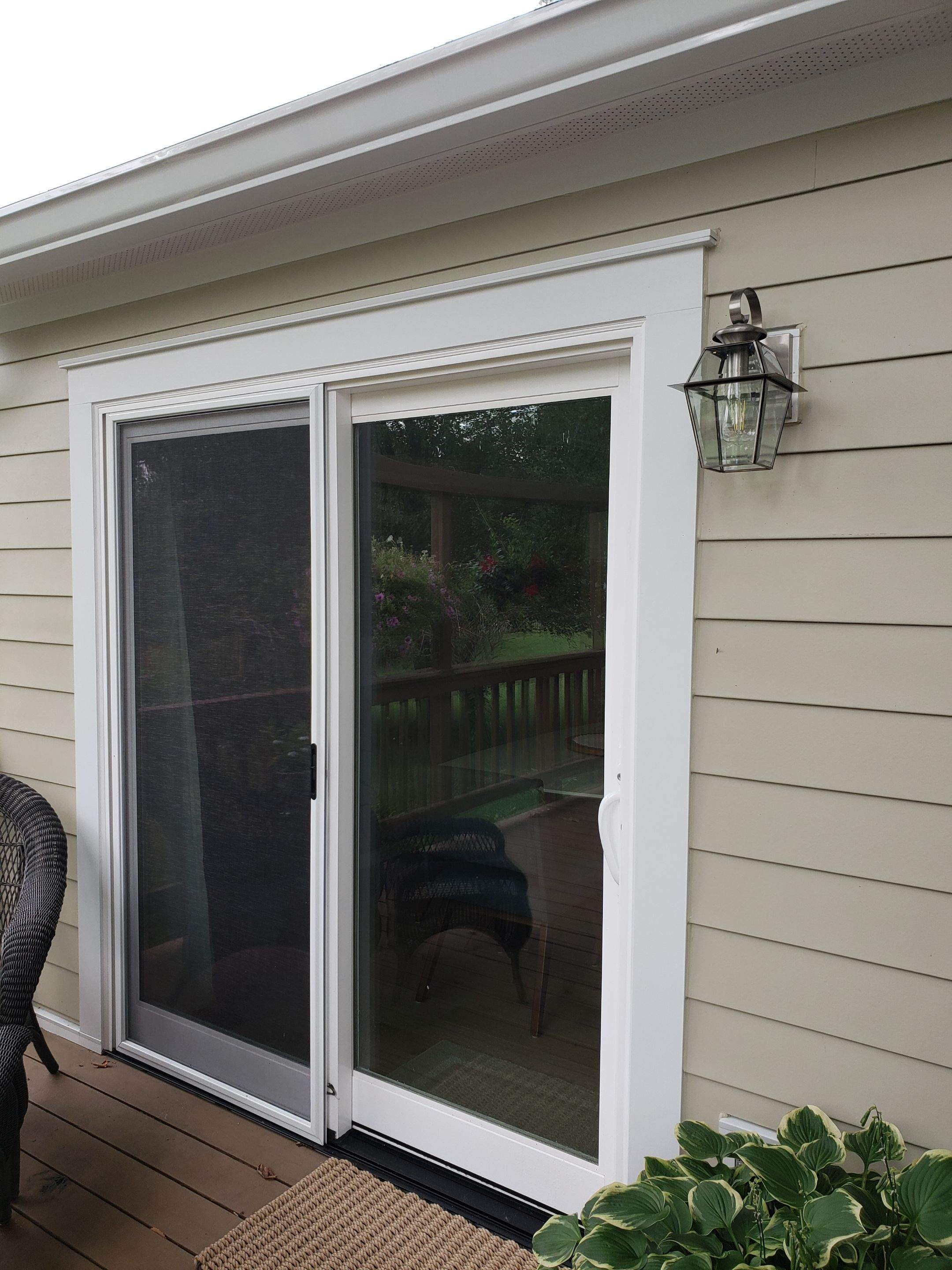 New composite windows and fiber cement siding with trim and gutters by Window Depot of Annapolis