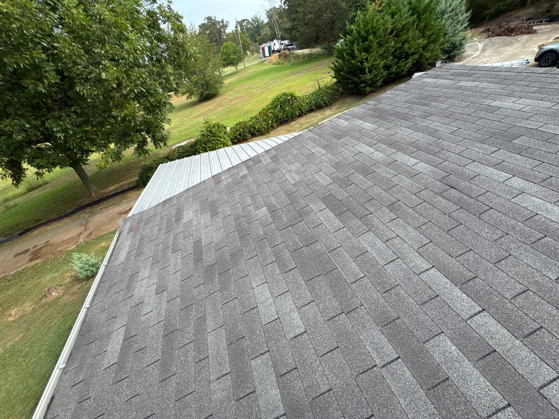 Roof Replacement in Pinson (Metal Roof) by The Roofing Dudes