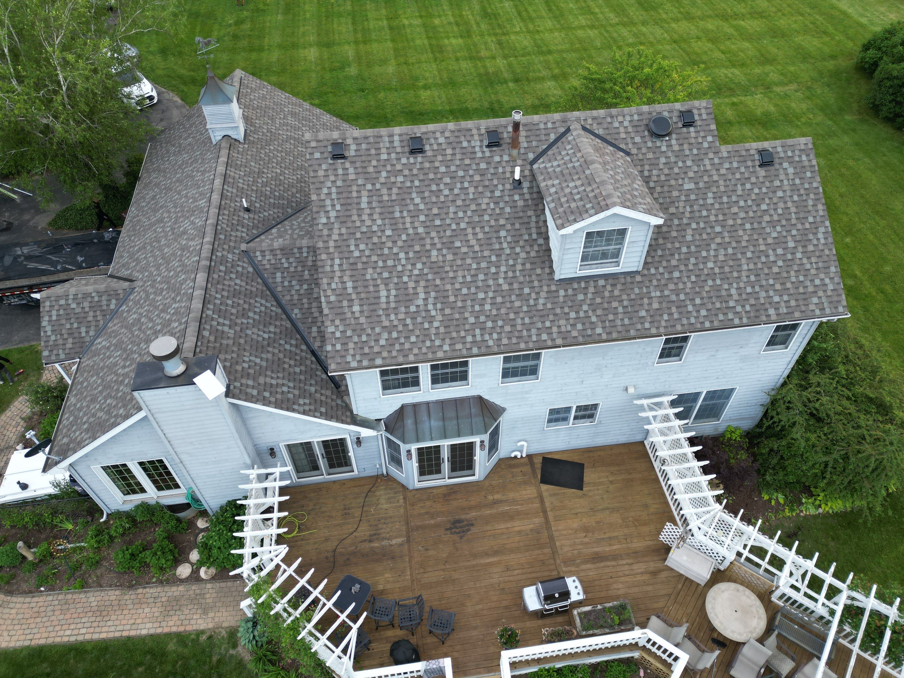 Roofing, copper chimney cap and copper awning by Optimal Home Improvement 