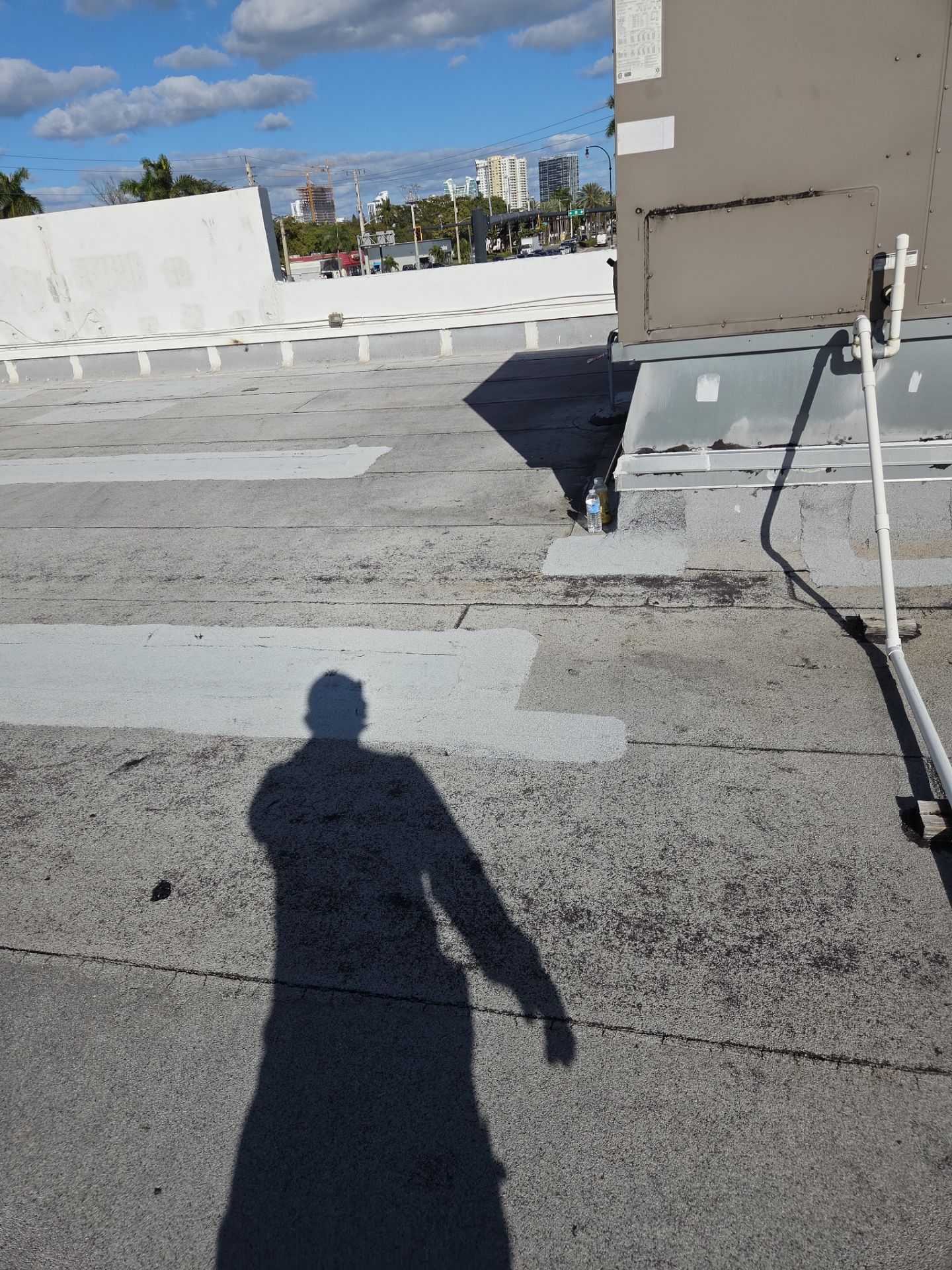 Commercial Flat Roof Restoration Using Silicone Coating in Hallandale Beach by Aastro Roofing